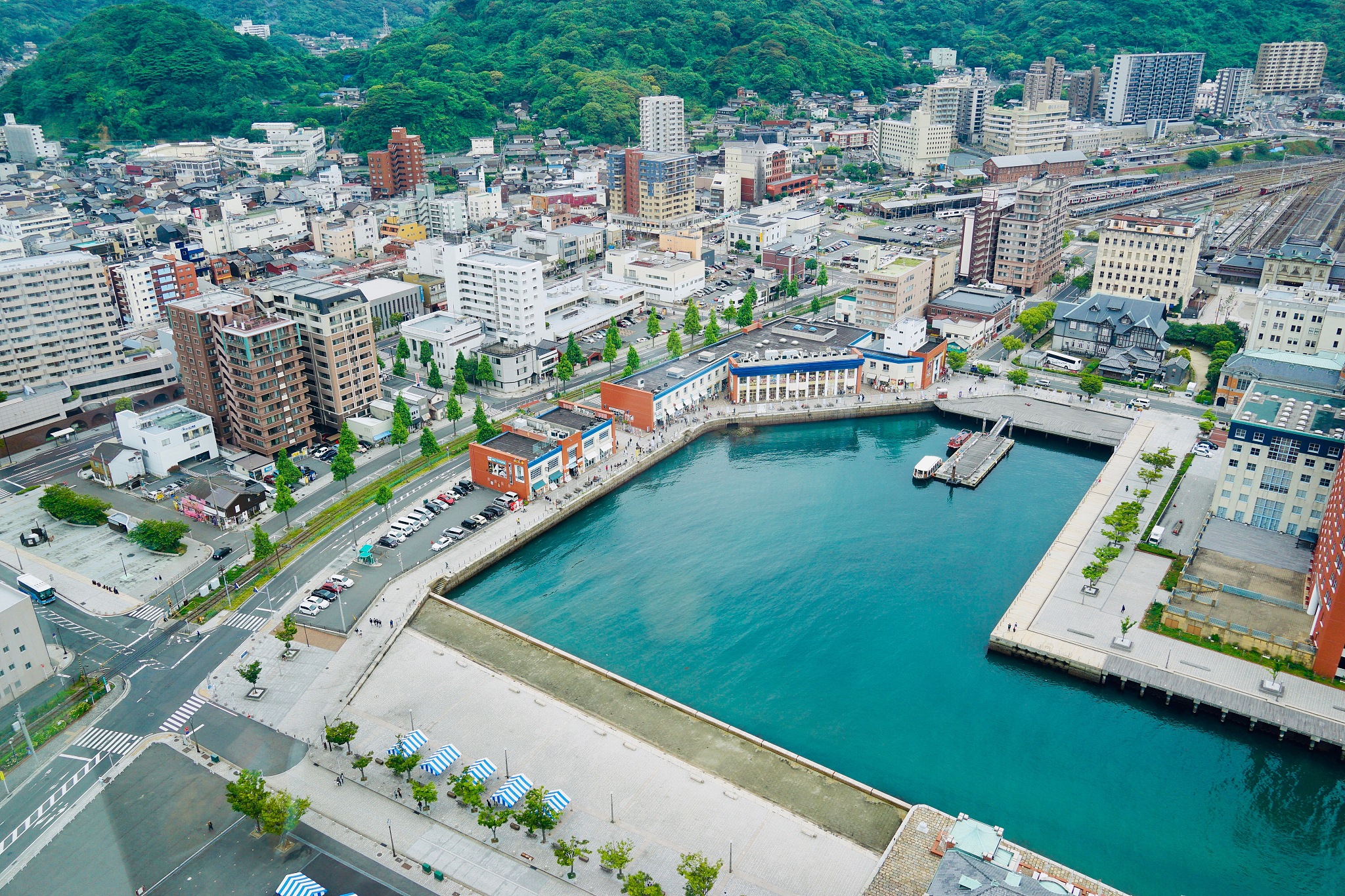 aerial view of lake amidst buildings