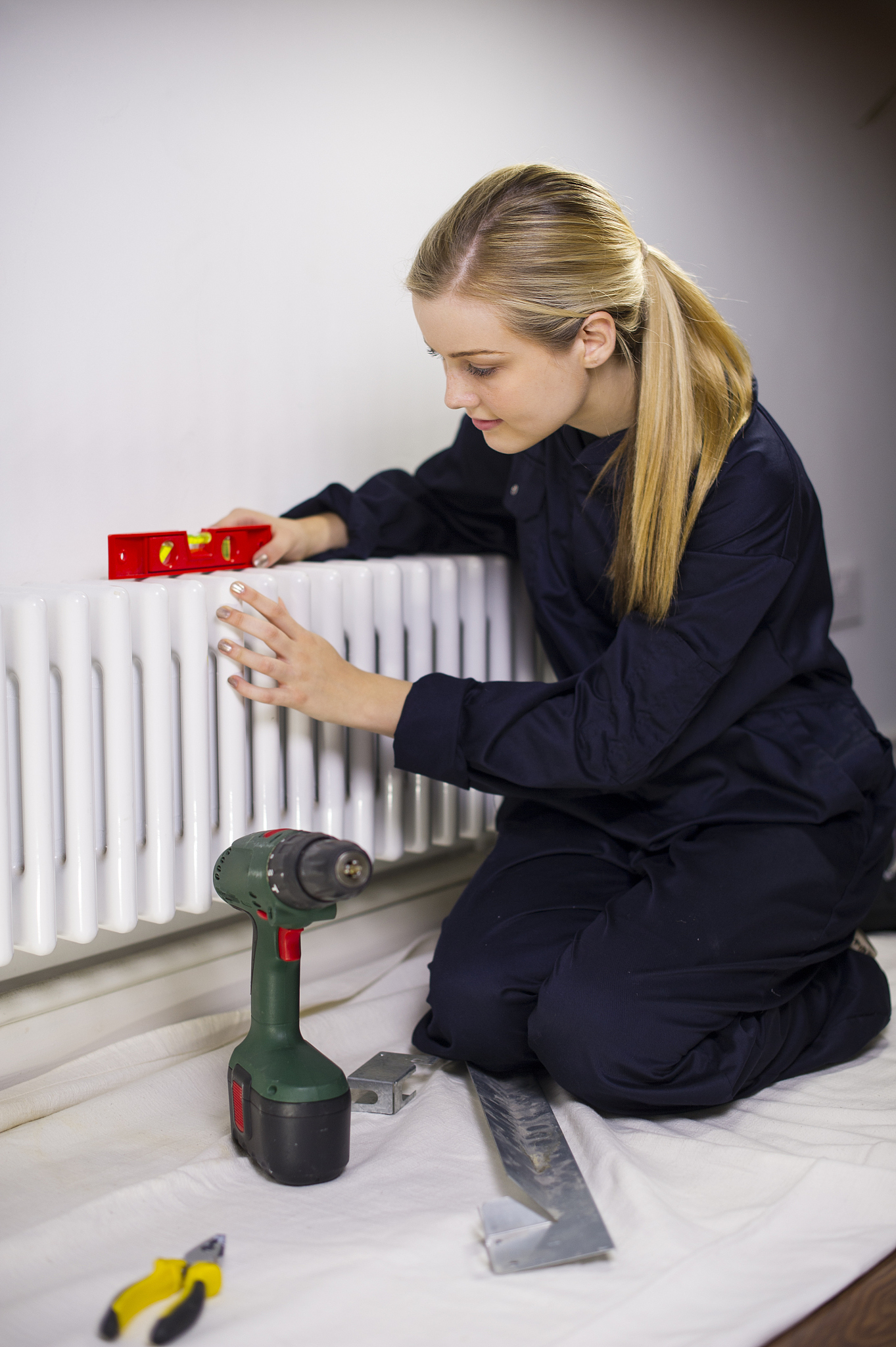female apprentice plumber