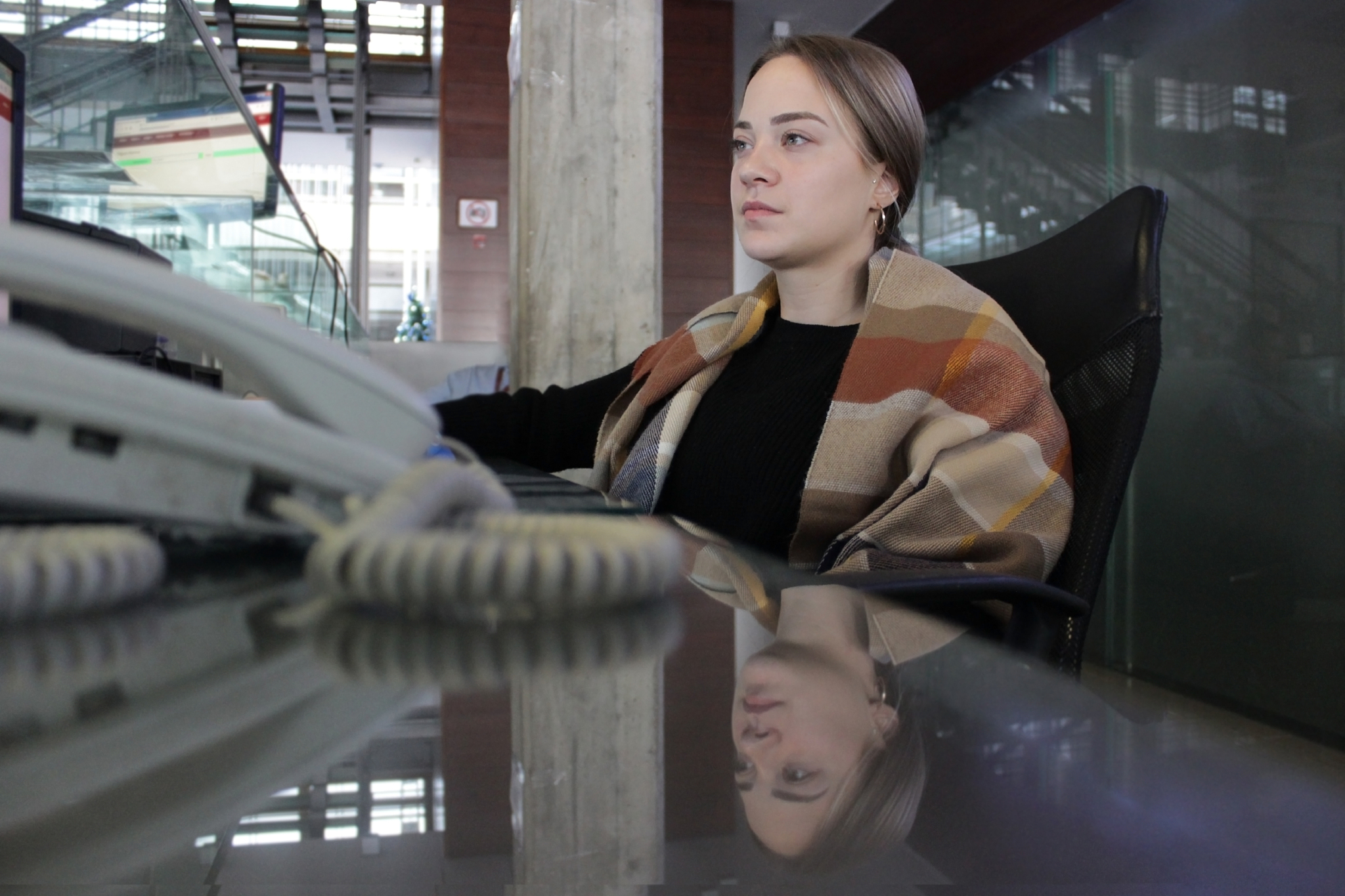 young beautiful girl at the reception desk