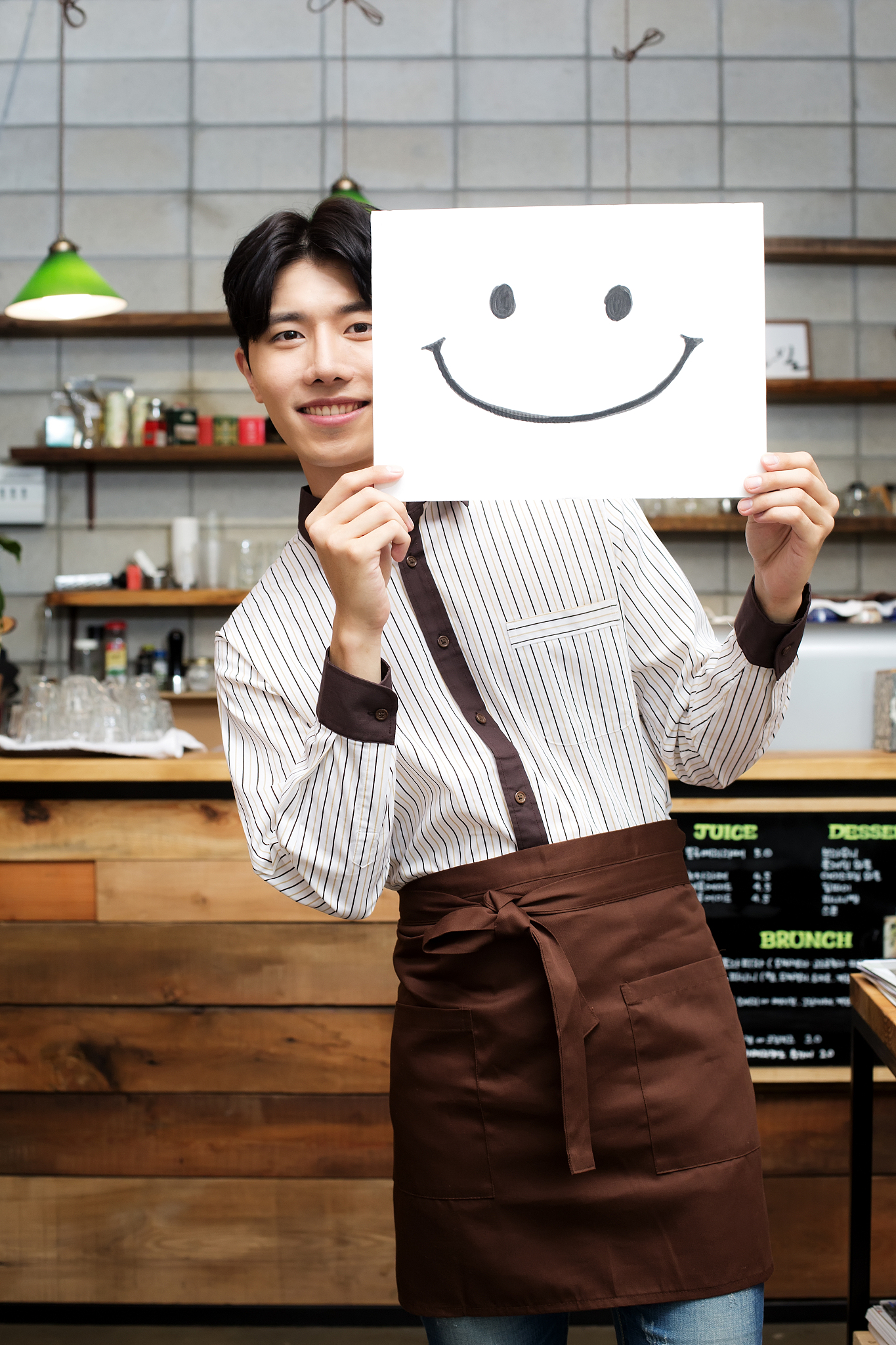 male barista at a cafe