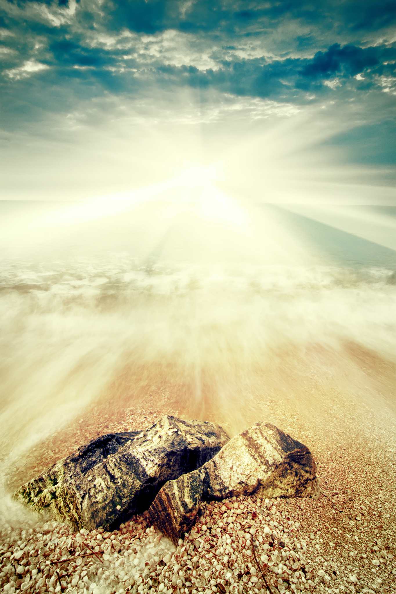 vintage  seascape with stone, sun and dramatic  sky, natural bac