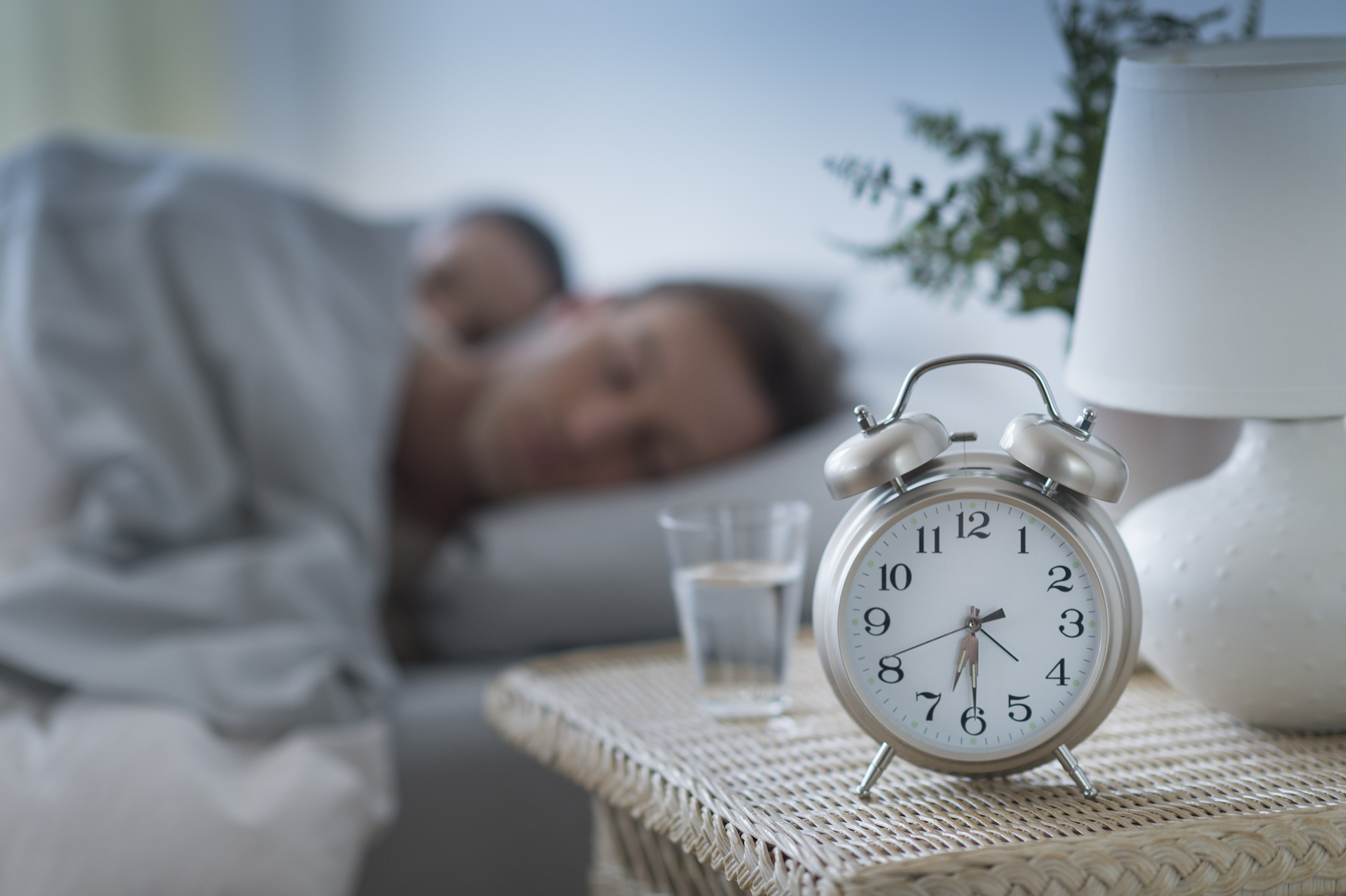 usa, new jersey, jersey city, alarm clock in bedroom