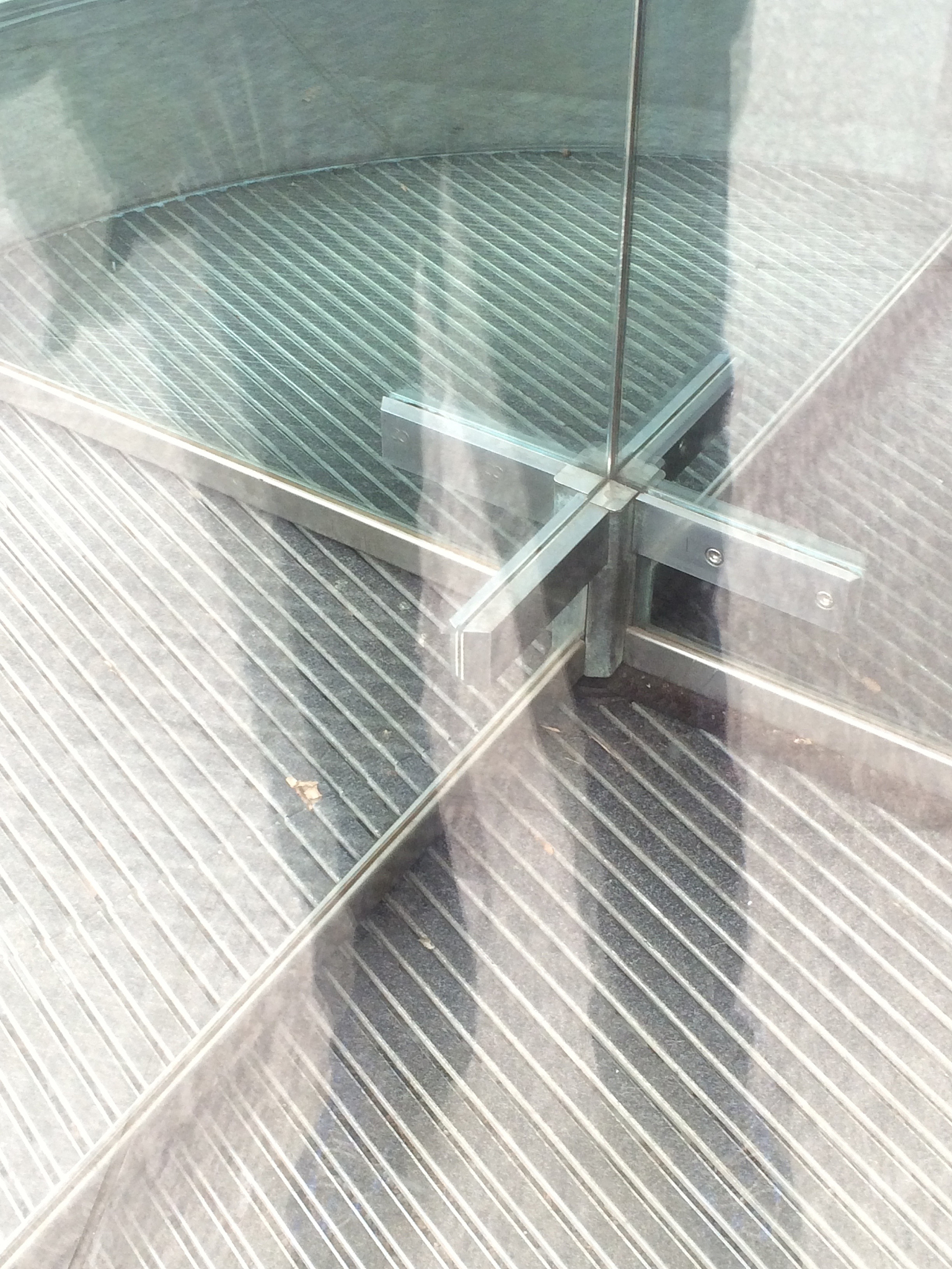 reflection of man on glass