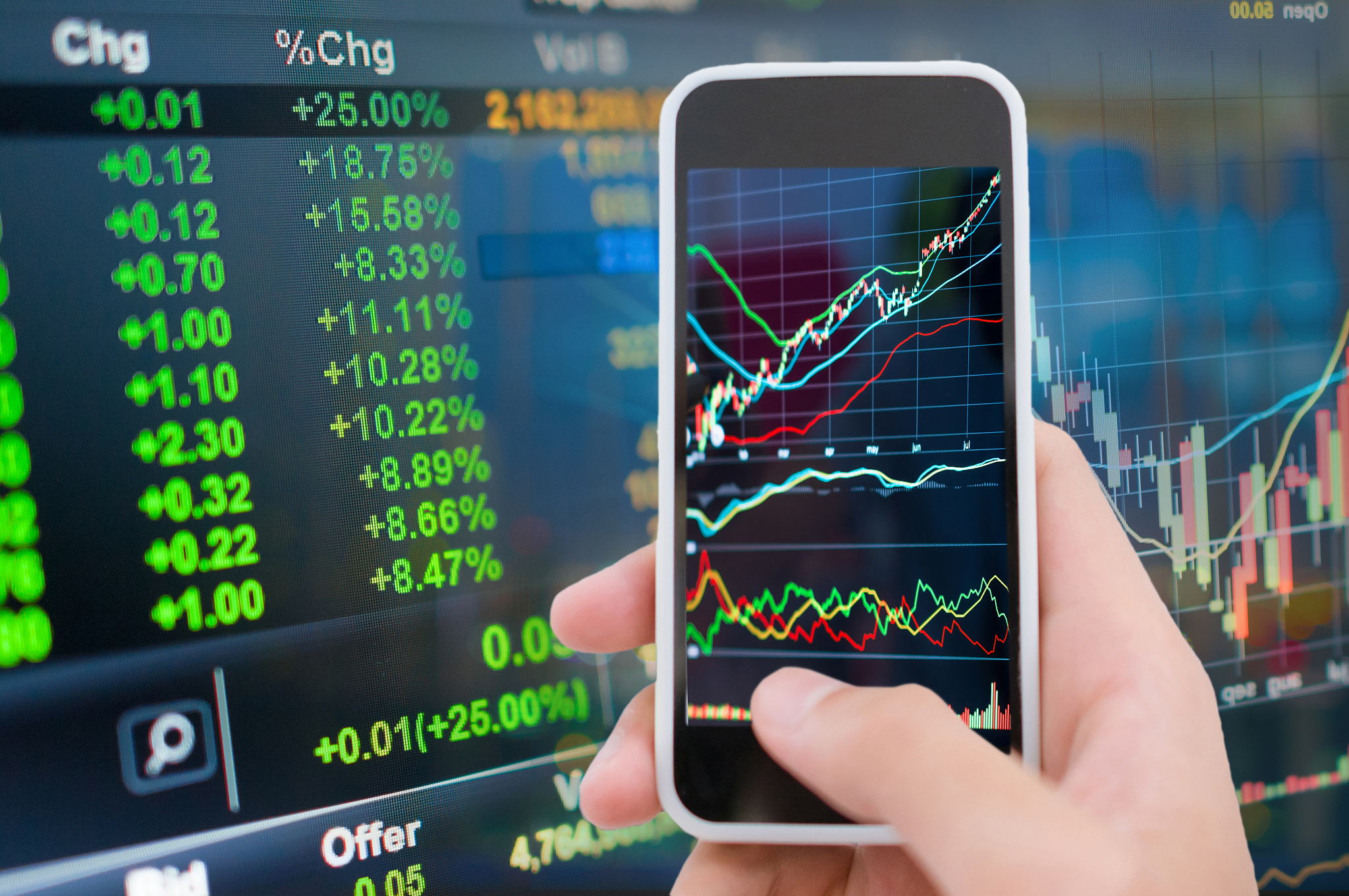 asian businessman using a smart phone analysis stock