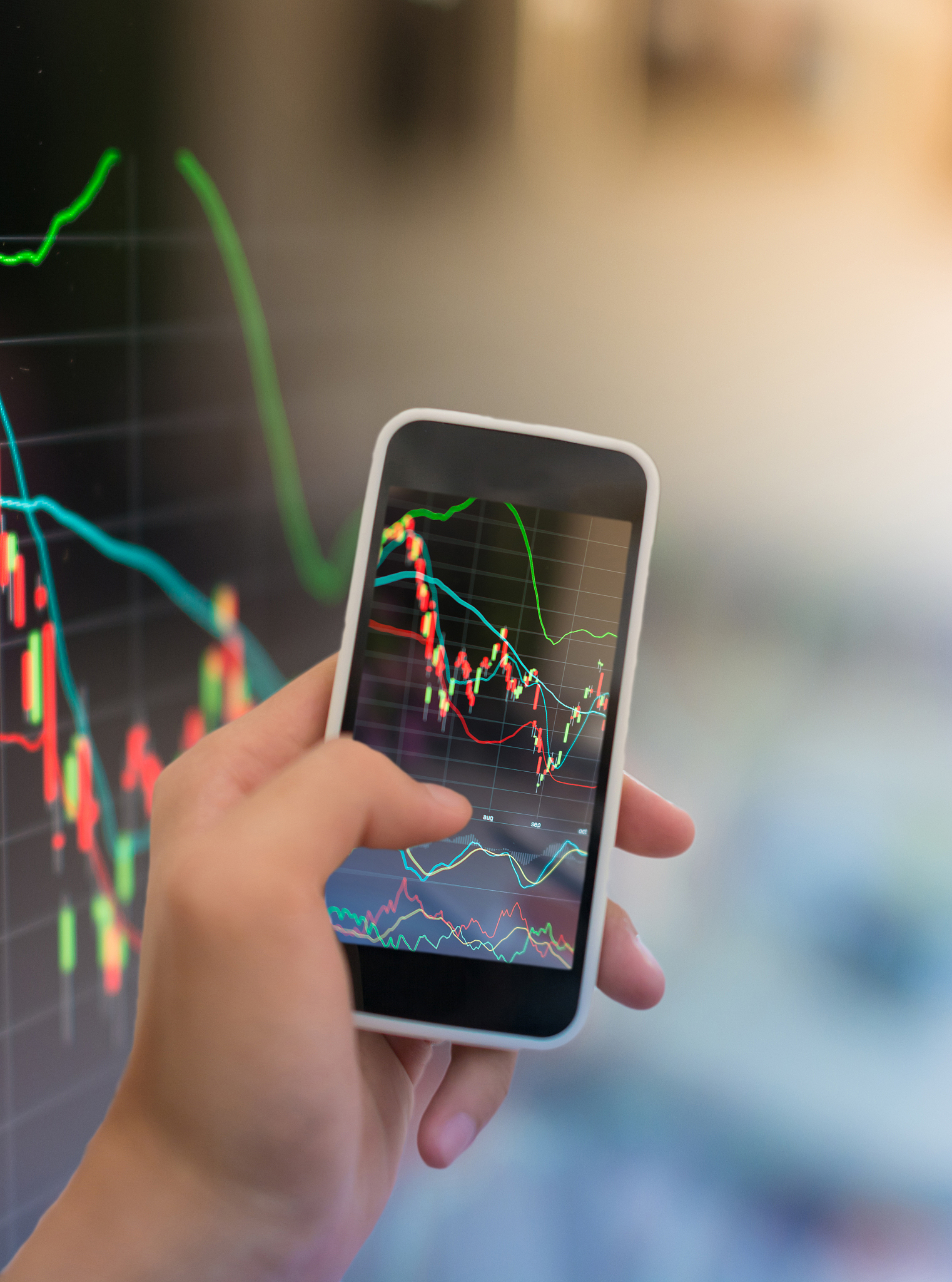 stock market graph and smart phone