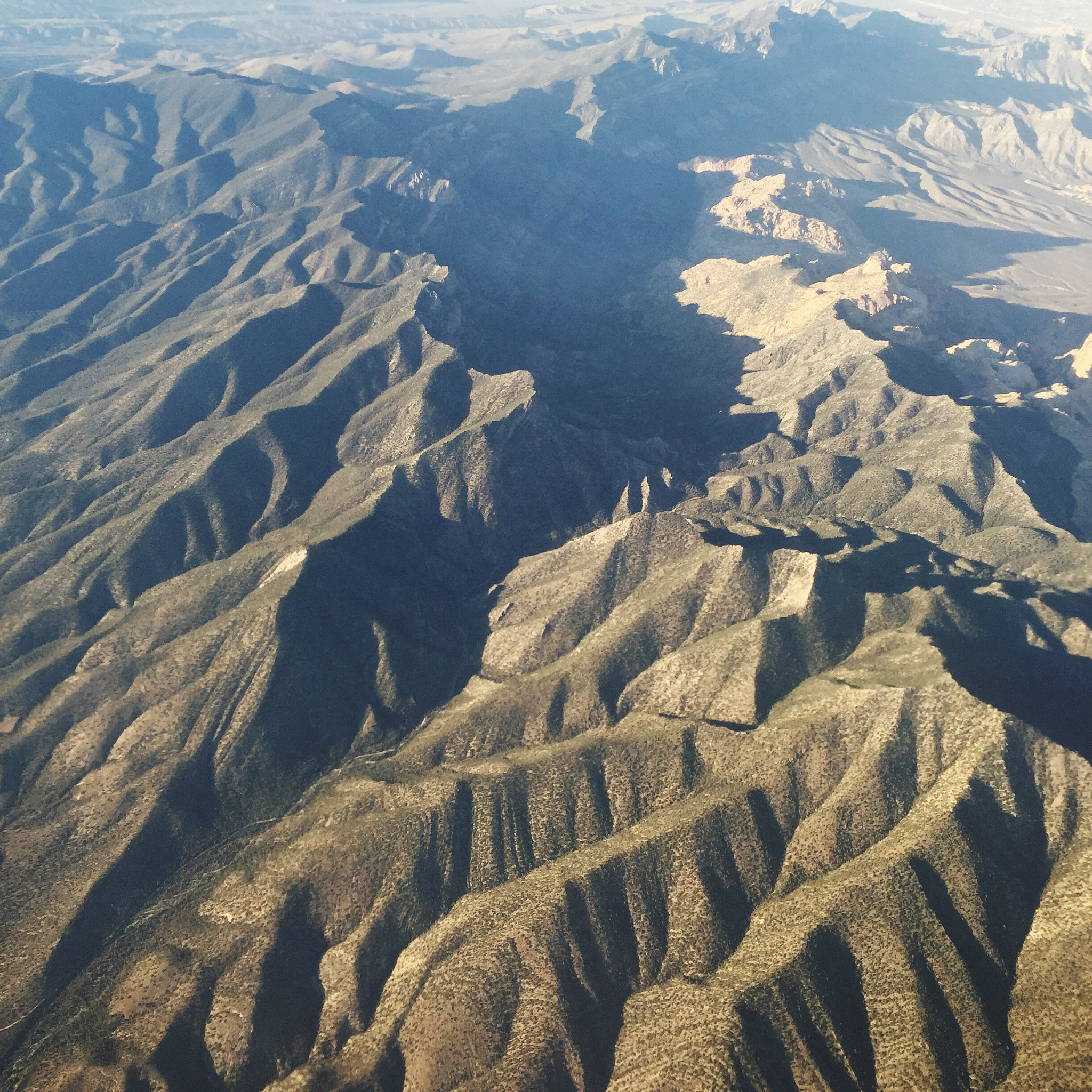 aerial view of sand dunes in desert