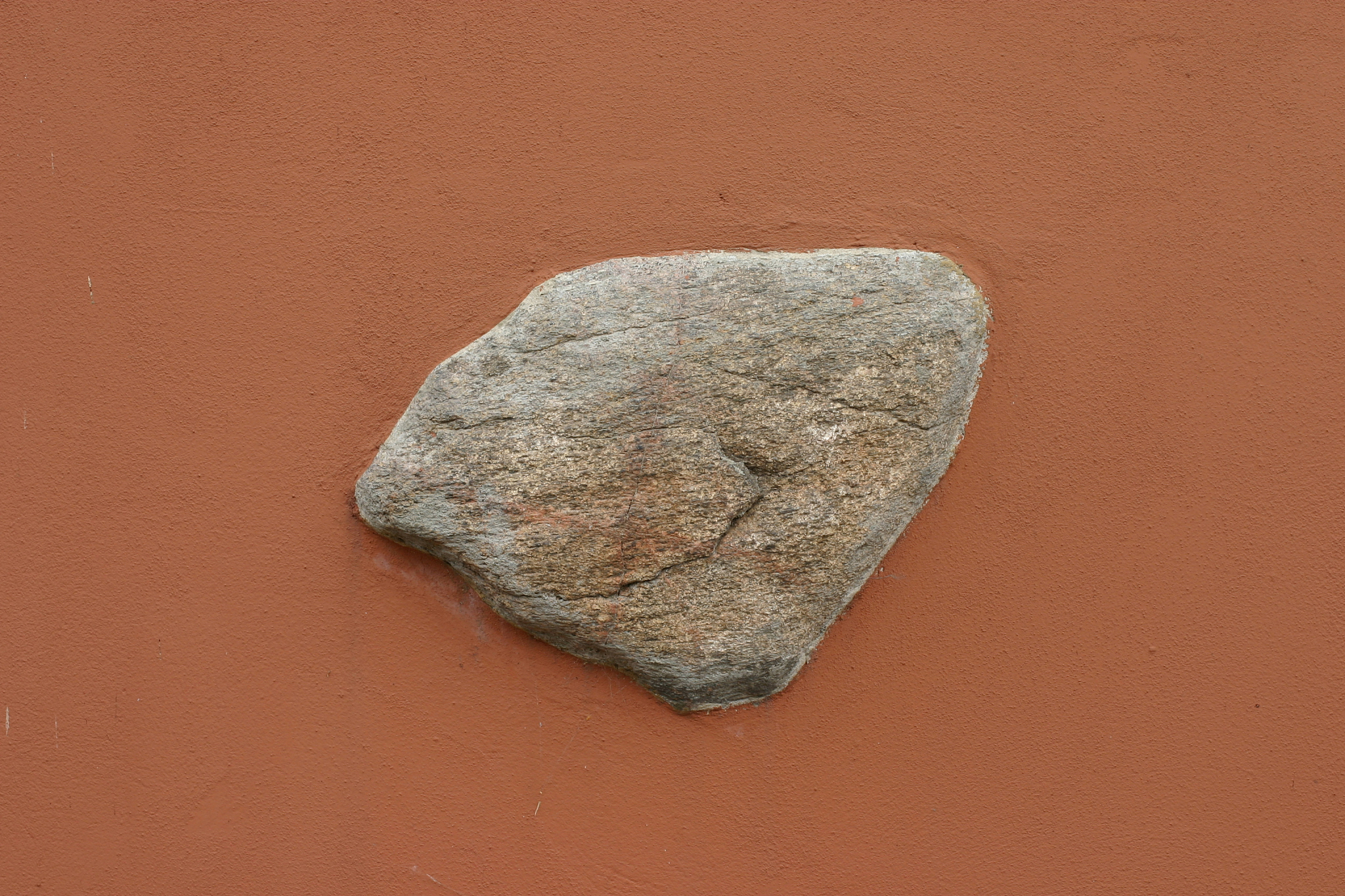 stone in the wall