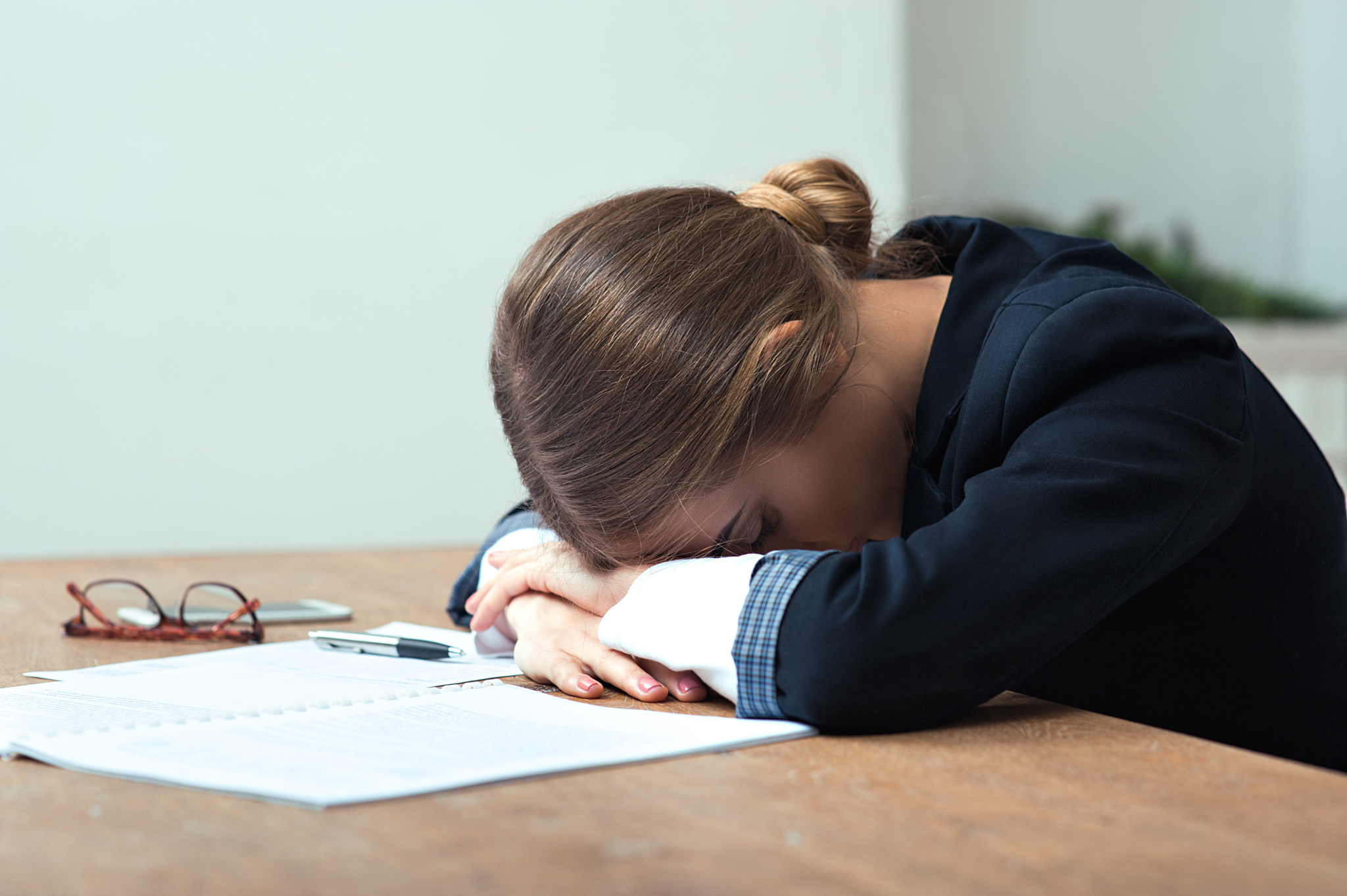 tried business woman sleeping