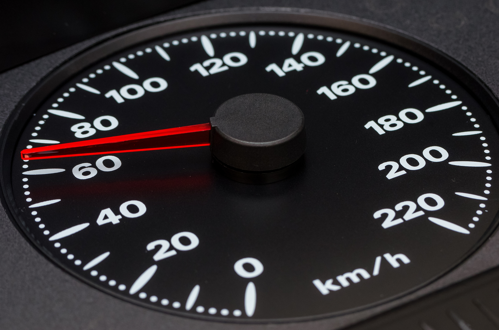 close up shot of a speedometer in a car, 60 km/h