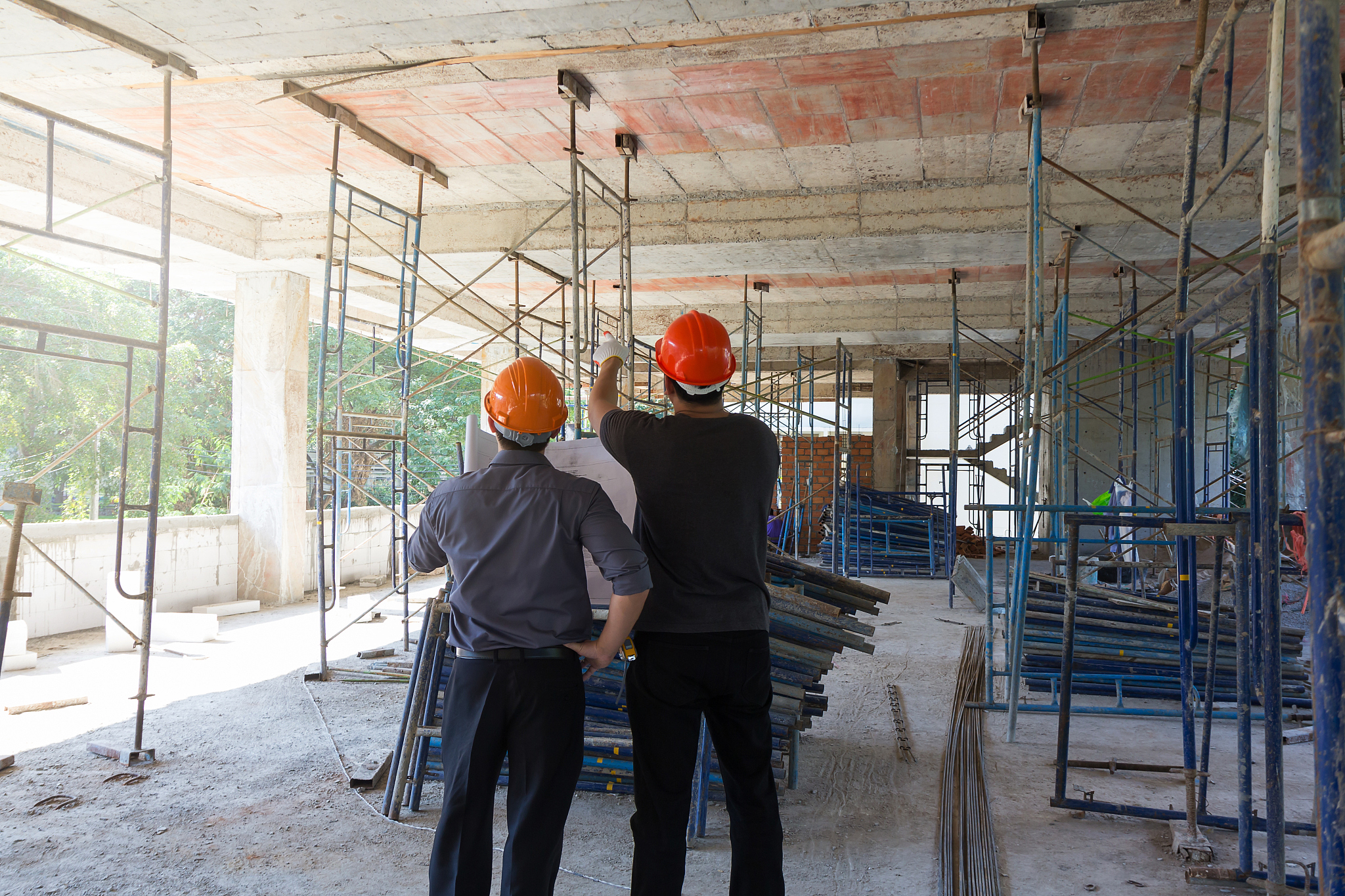 construction concepts, engineer and architect working at constru