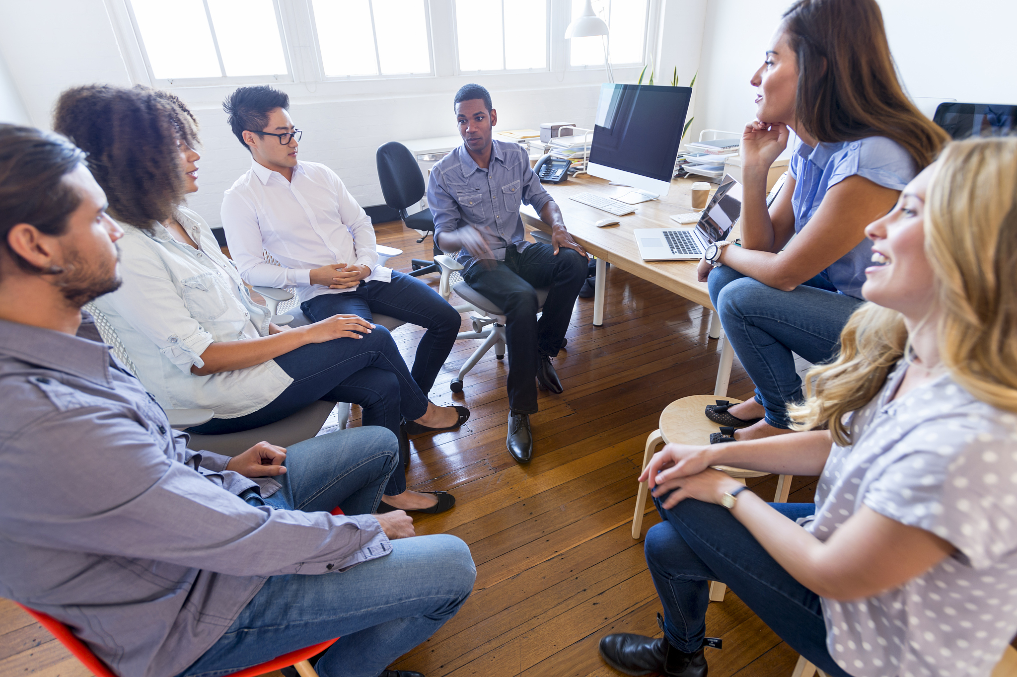 multi cultural group of business people in a meeting.