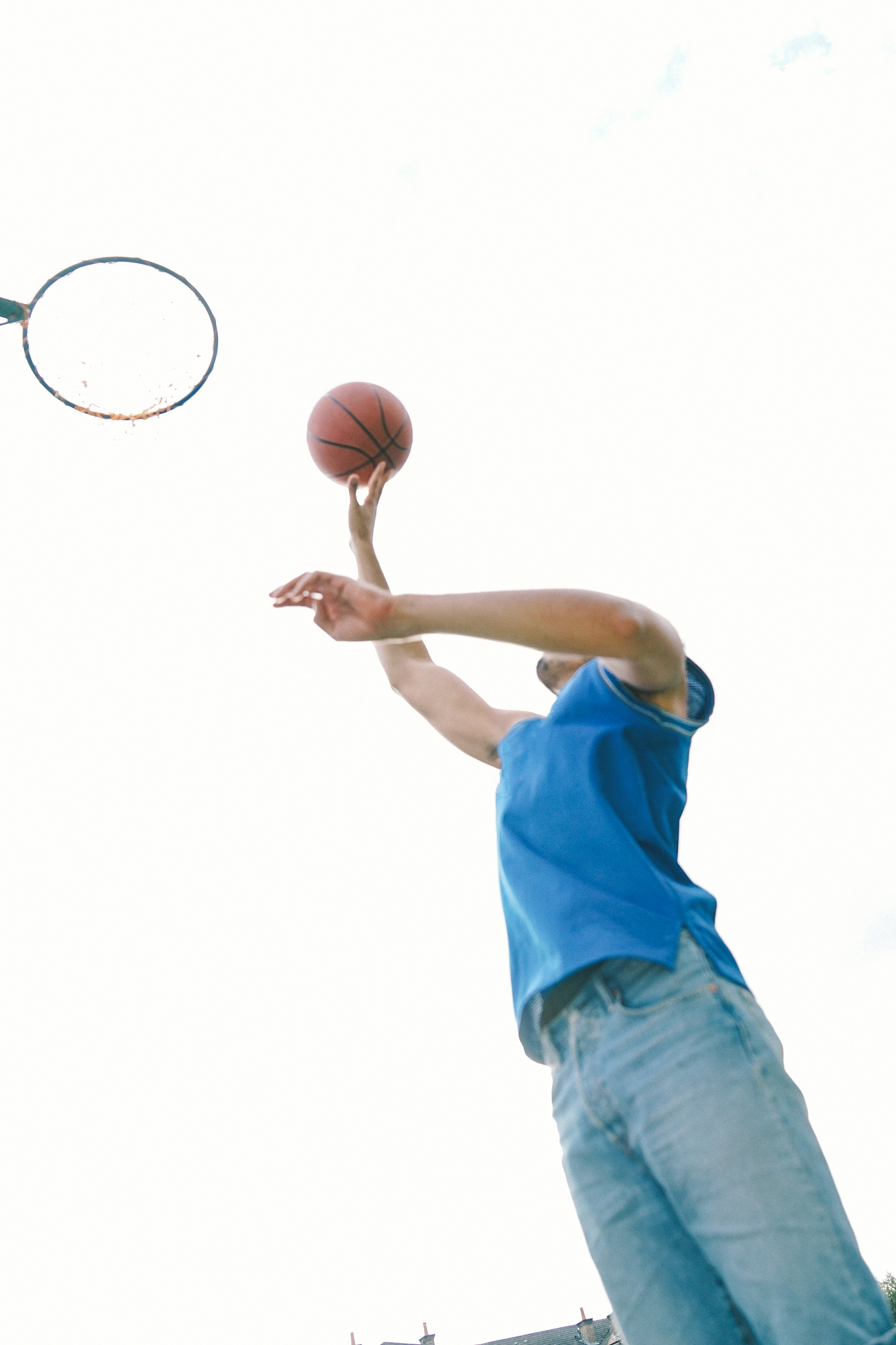 basketball player on the court, slam dunking ball
