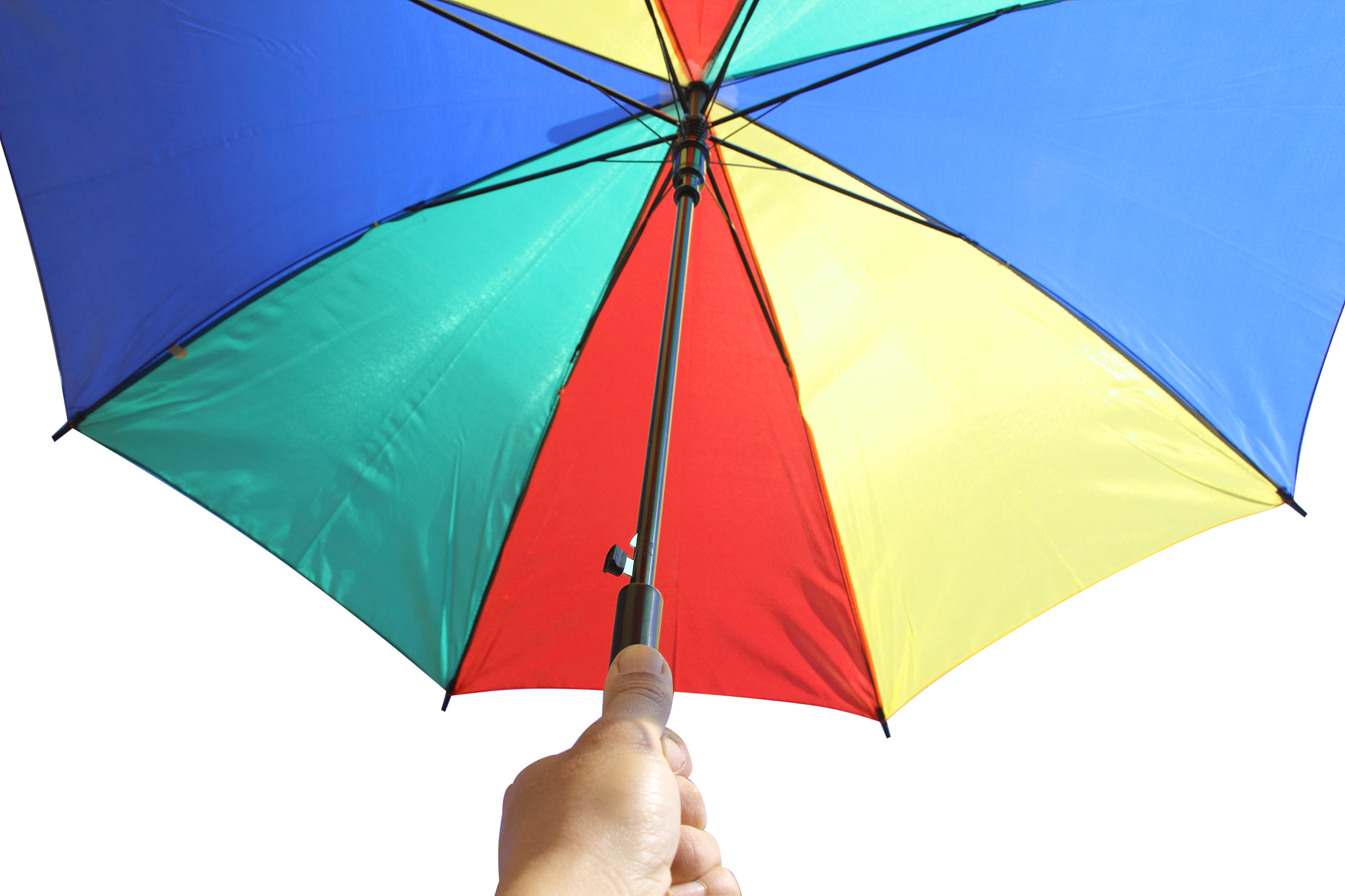 cropped hand of person holding umbrella against sky