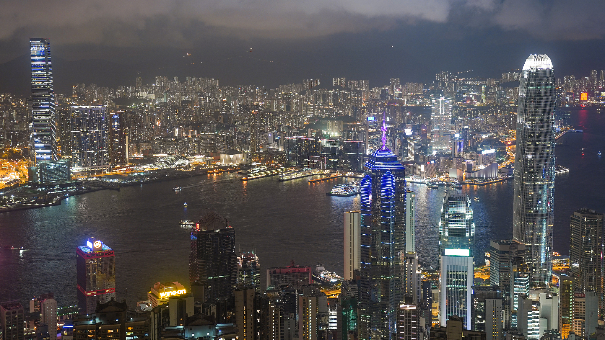 panoramic aerial shot of the hongkong cityscape skyline at sunse