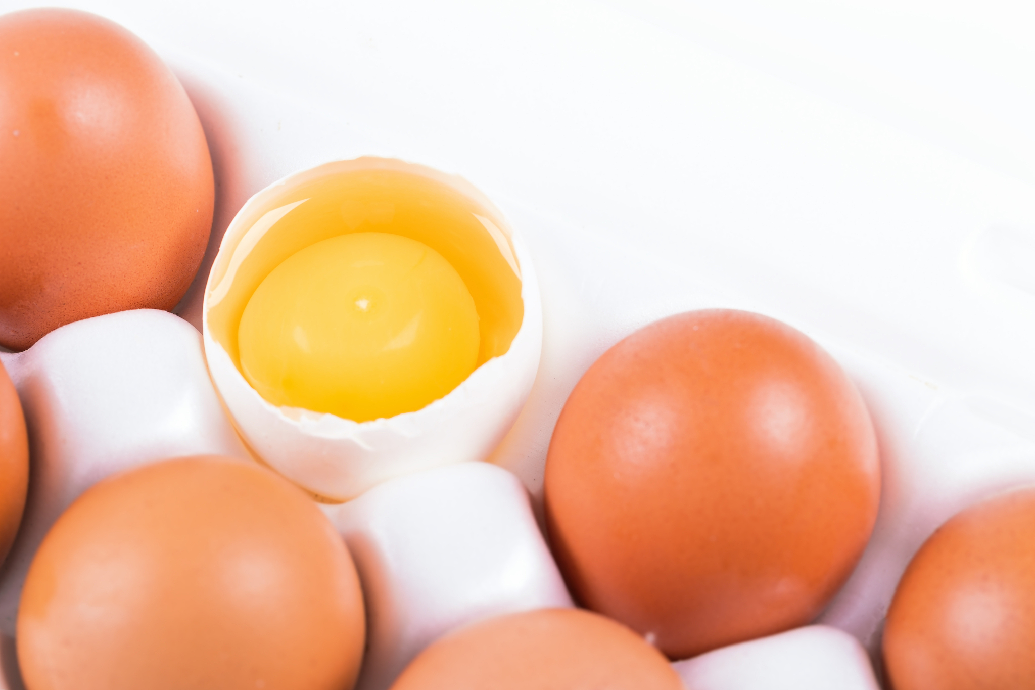 fresh eggs in white box, closeup,
