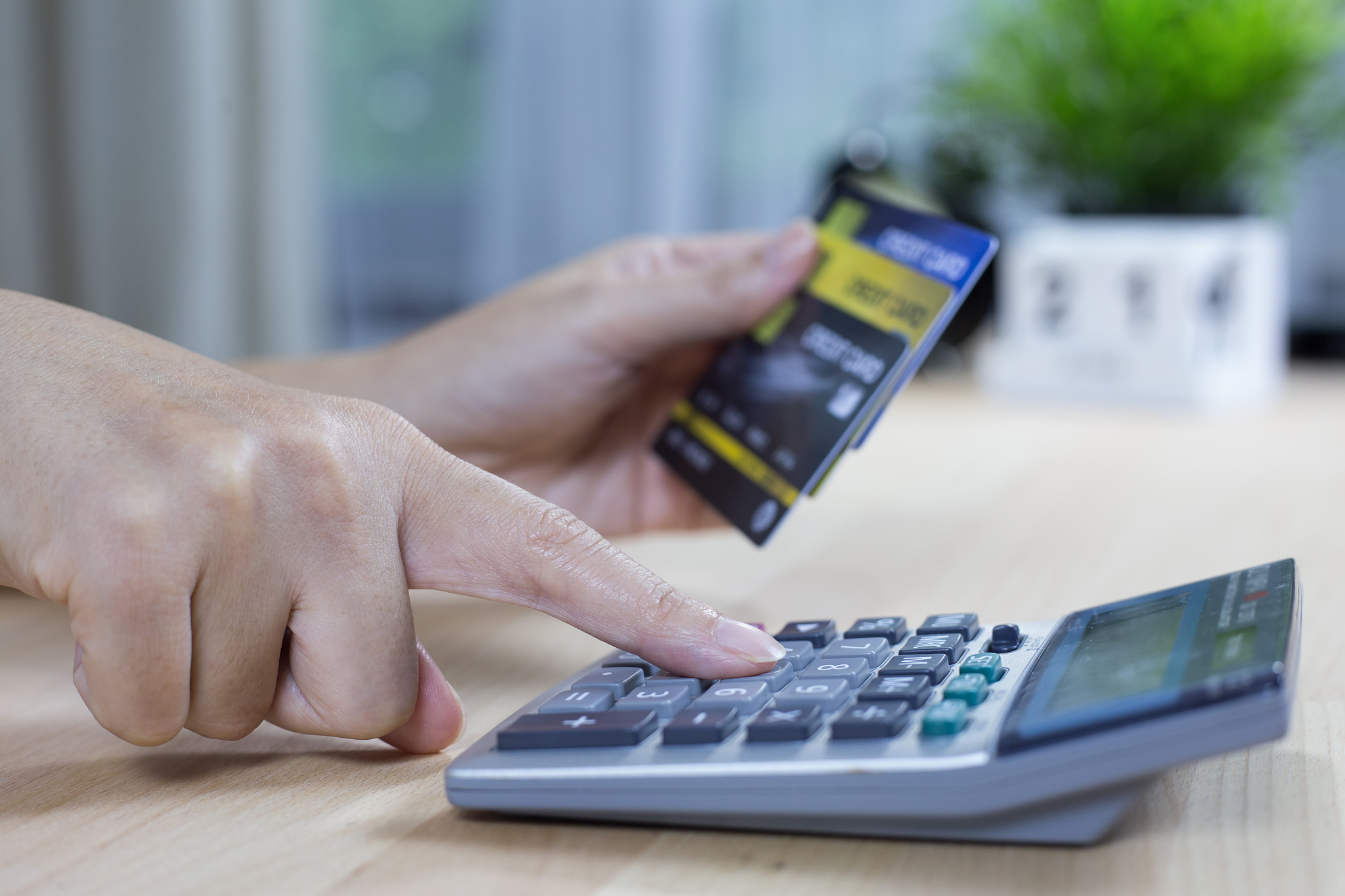 hand holding credit card with shopping online. online payment co