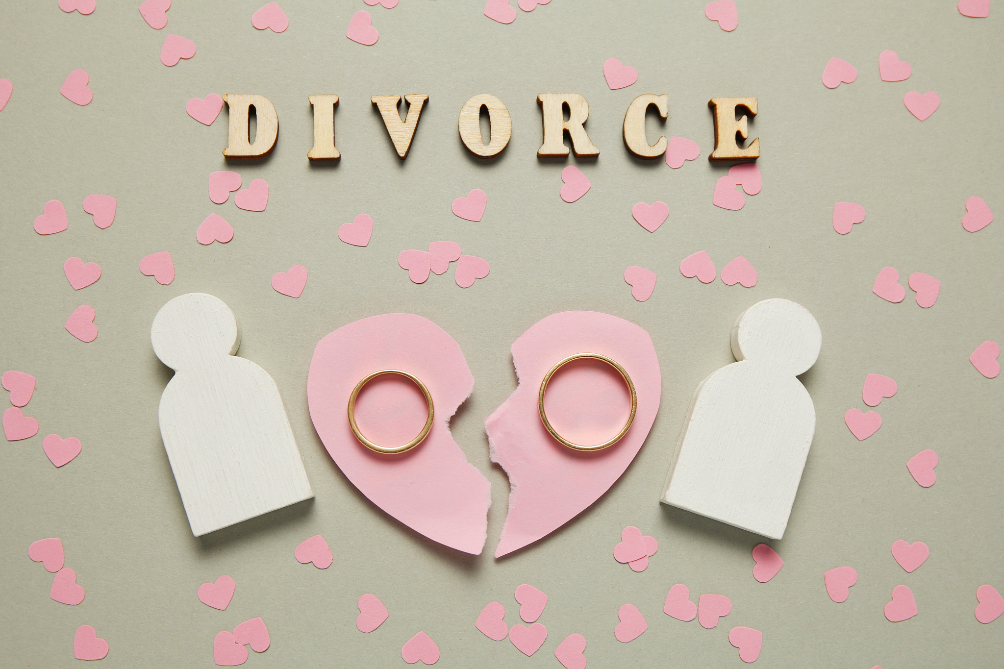 broken heart and two gold rings. marriage end, court and divorce