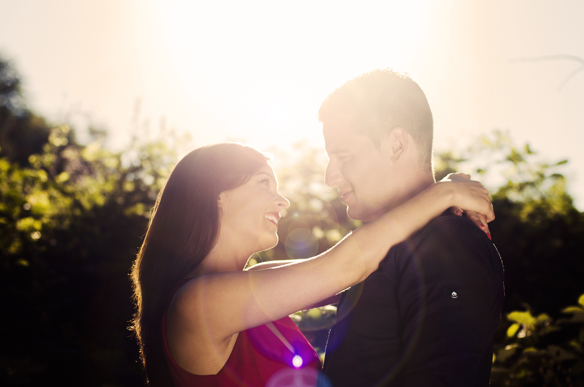 beautiful embraced couple in the park
