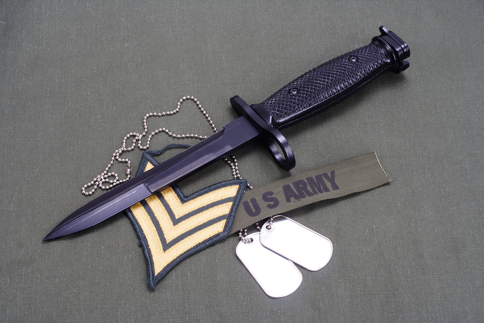 bayonet on us army uniform background
