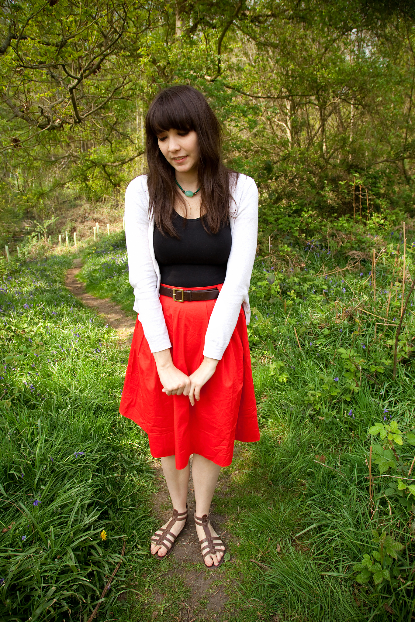 red skirt girl in woods