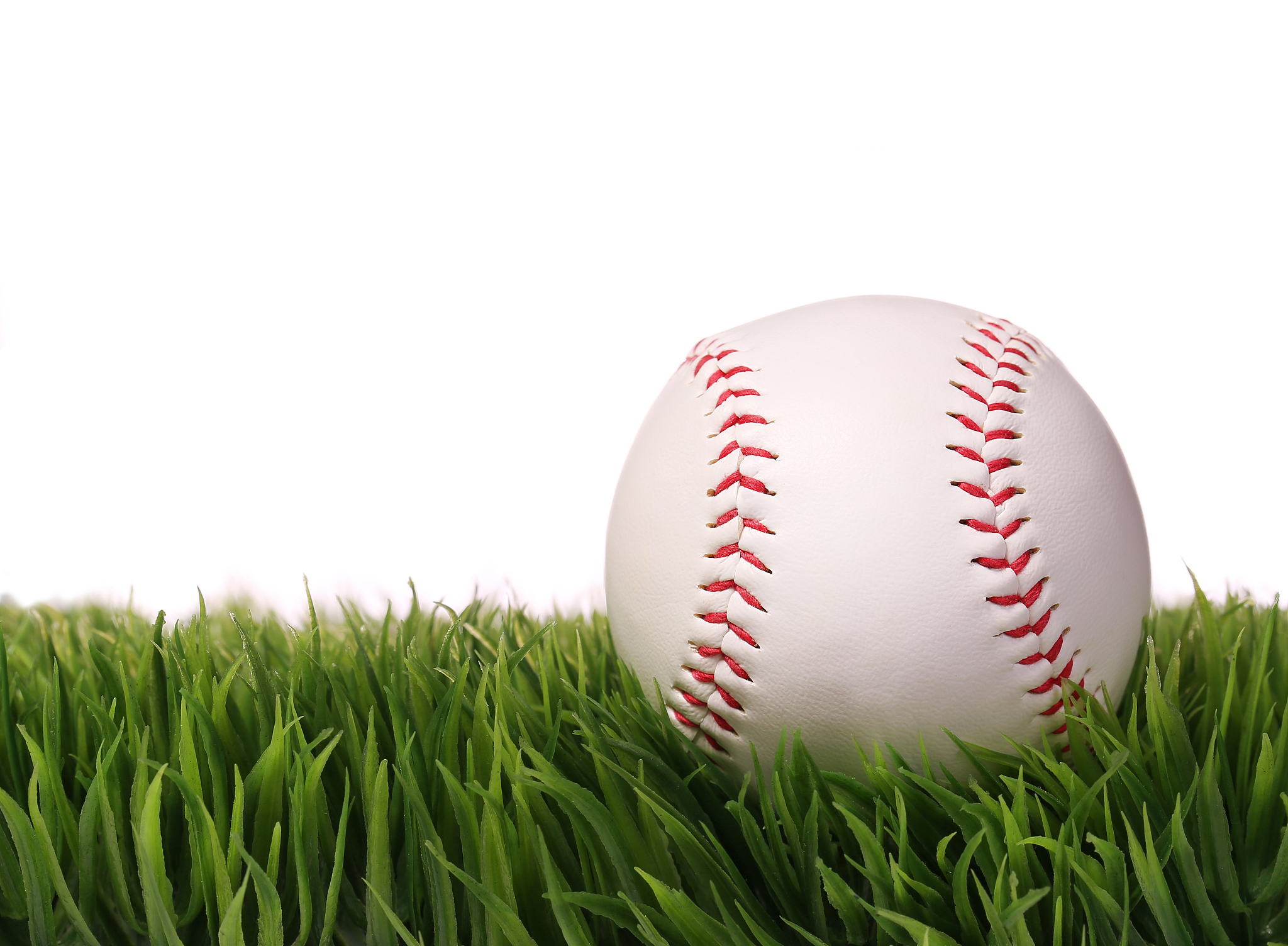 baseball on green grass, isolated on white. ball