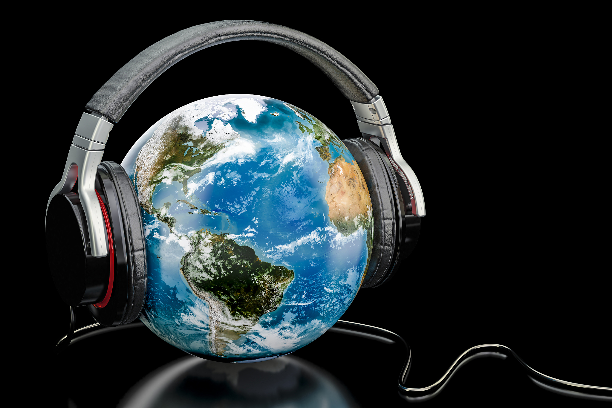 earth globe with wireless headphones, world music concept.