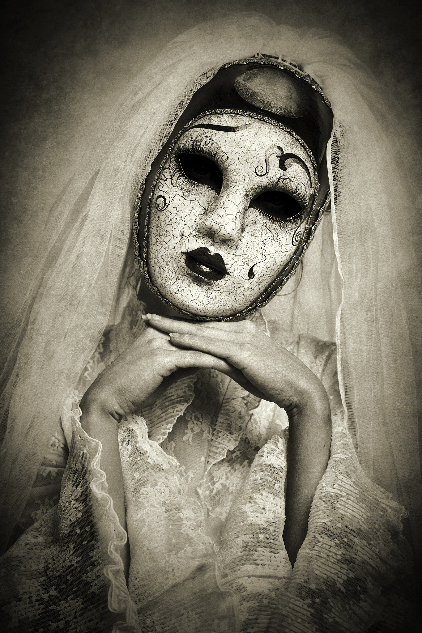 young bride wearing venetian mask