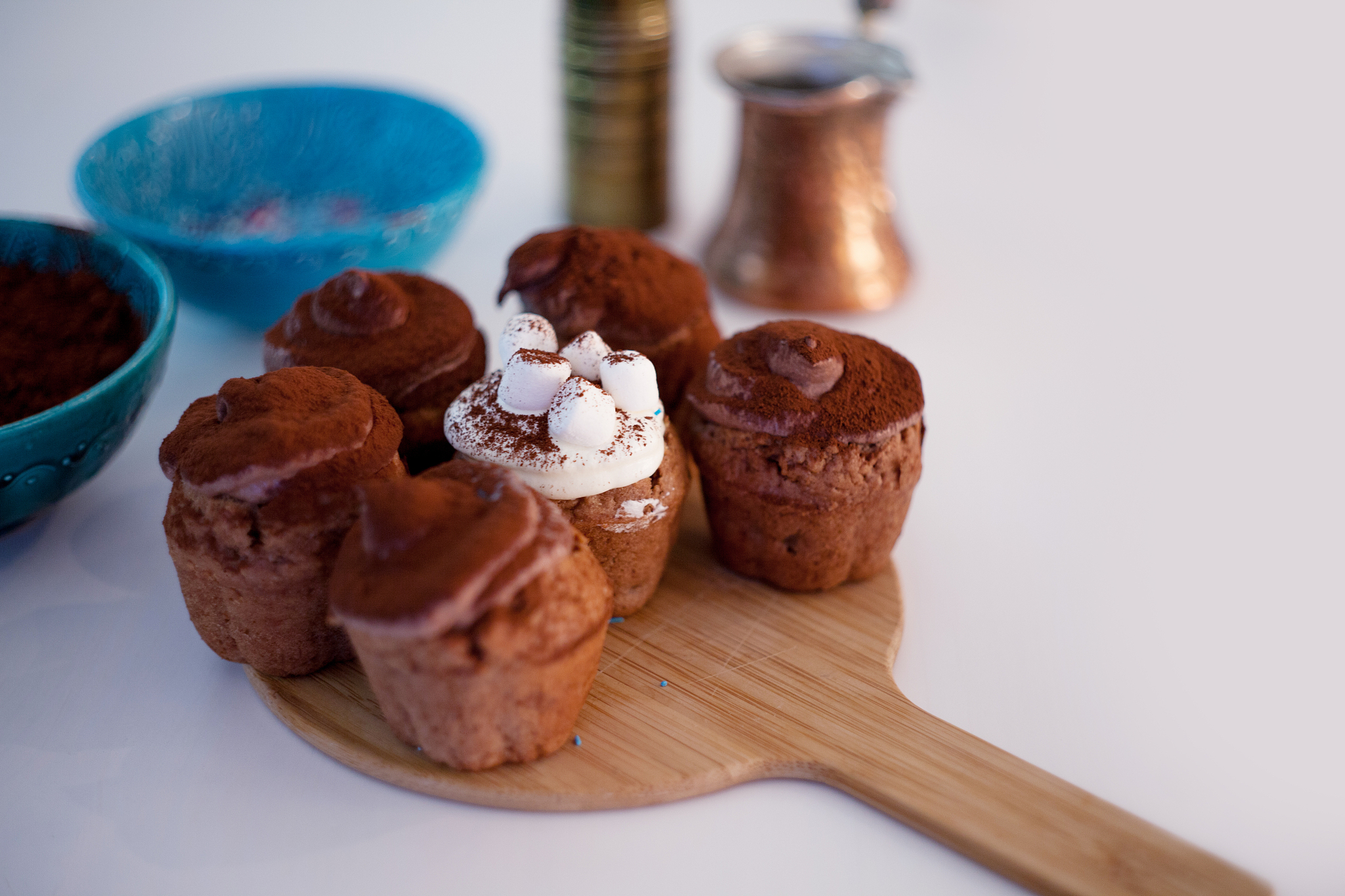 tasty birthday cupcake with candle on the table, blurred backgro