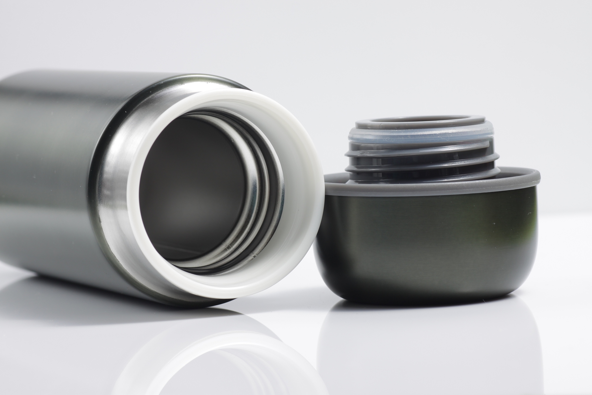metallic black insulated tumbler on a white isolated background
