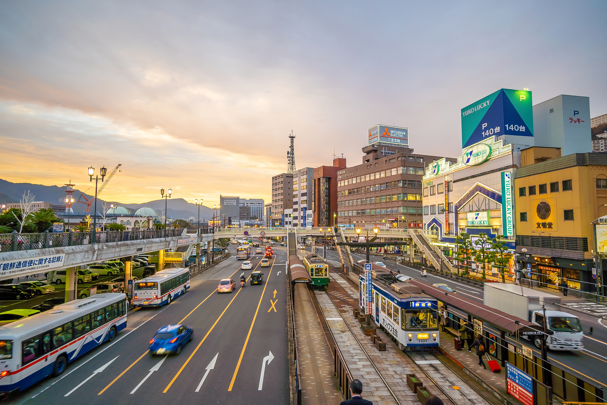 nagasaki city downtown skyline cityscape in kyushu japan at suns