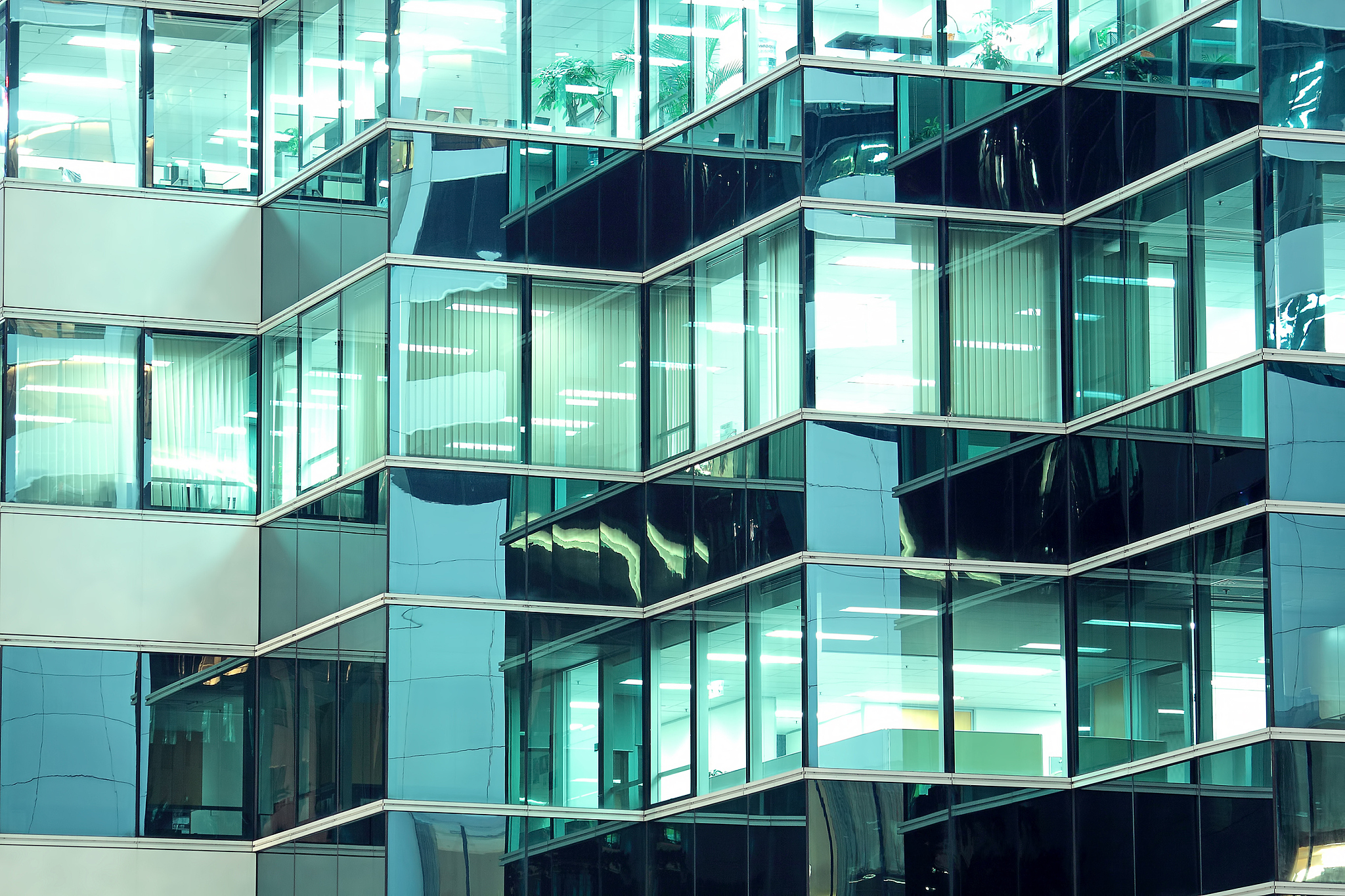 office building at night in blue