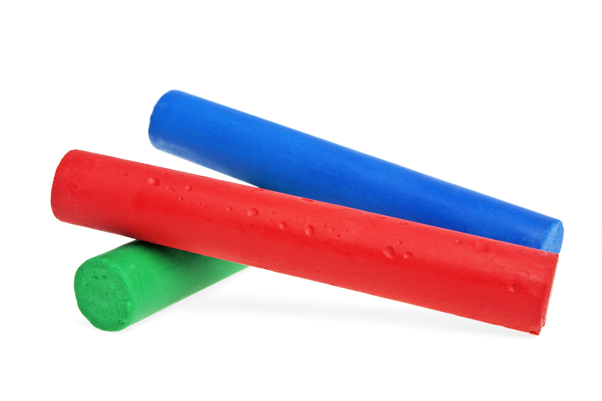 colorful chalks on a white background