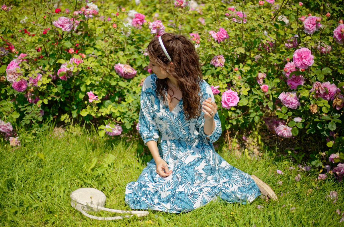 A Girl and a Rose: A Moment of Beauty in the Garden