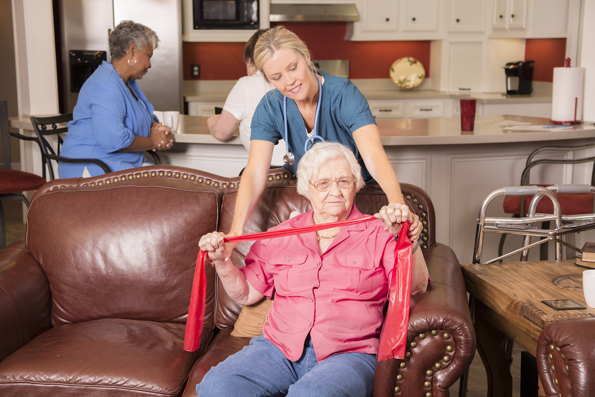 senior adult patient with home healthcare nurse. physical therap