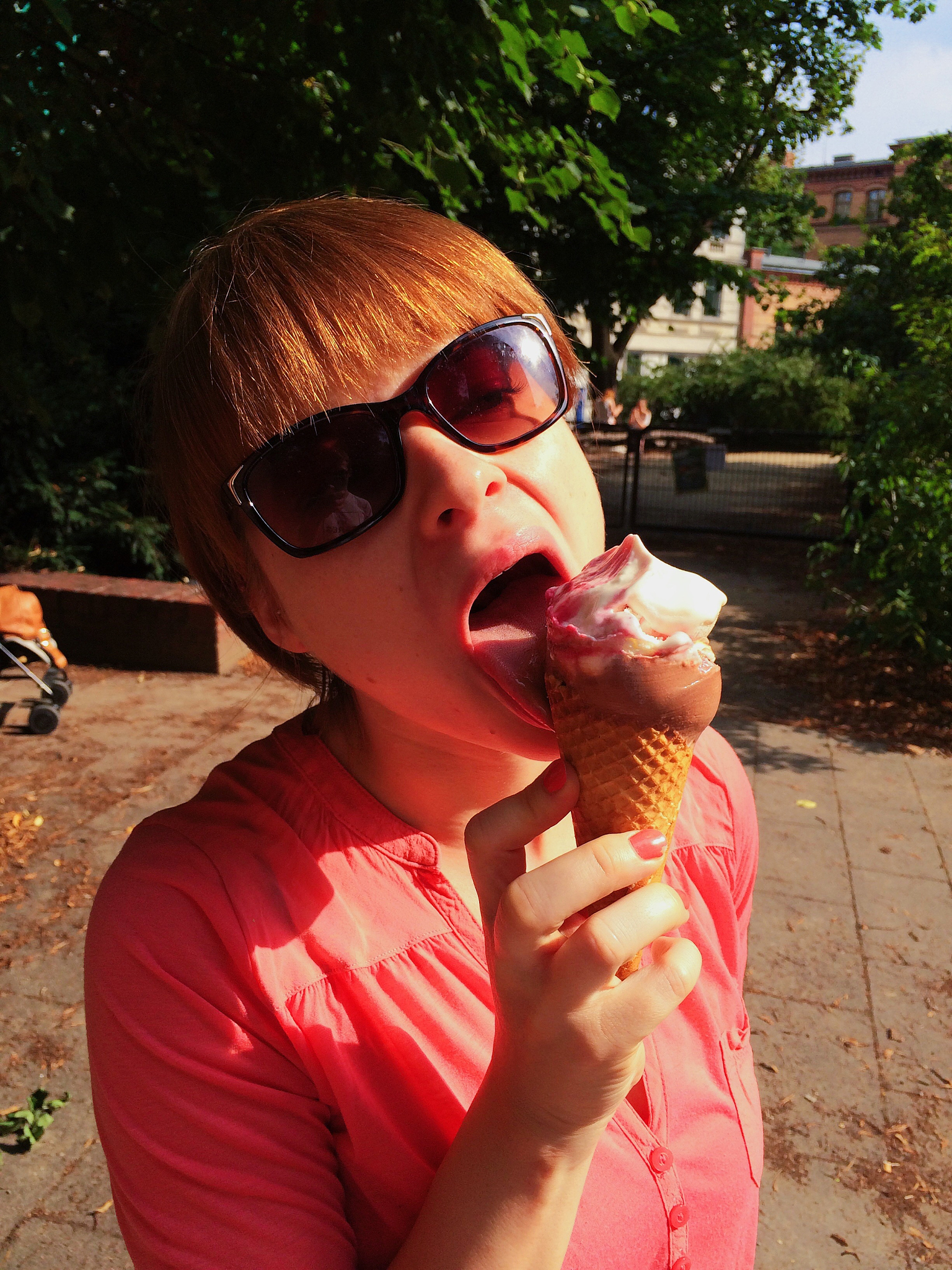 close-up of woman having ice cream in park