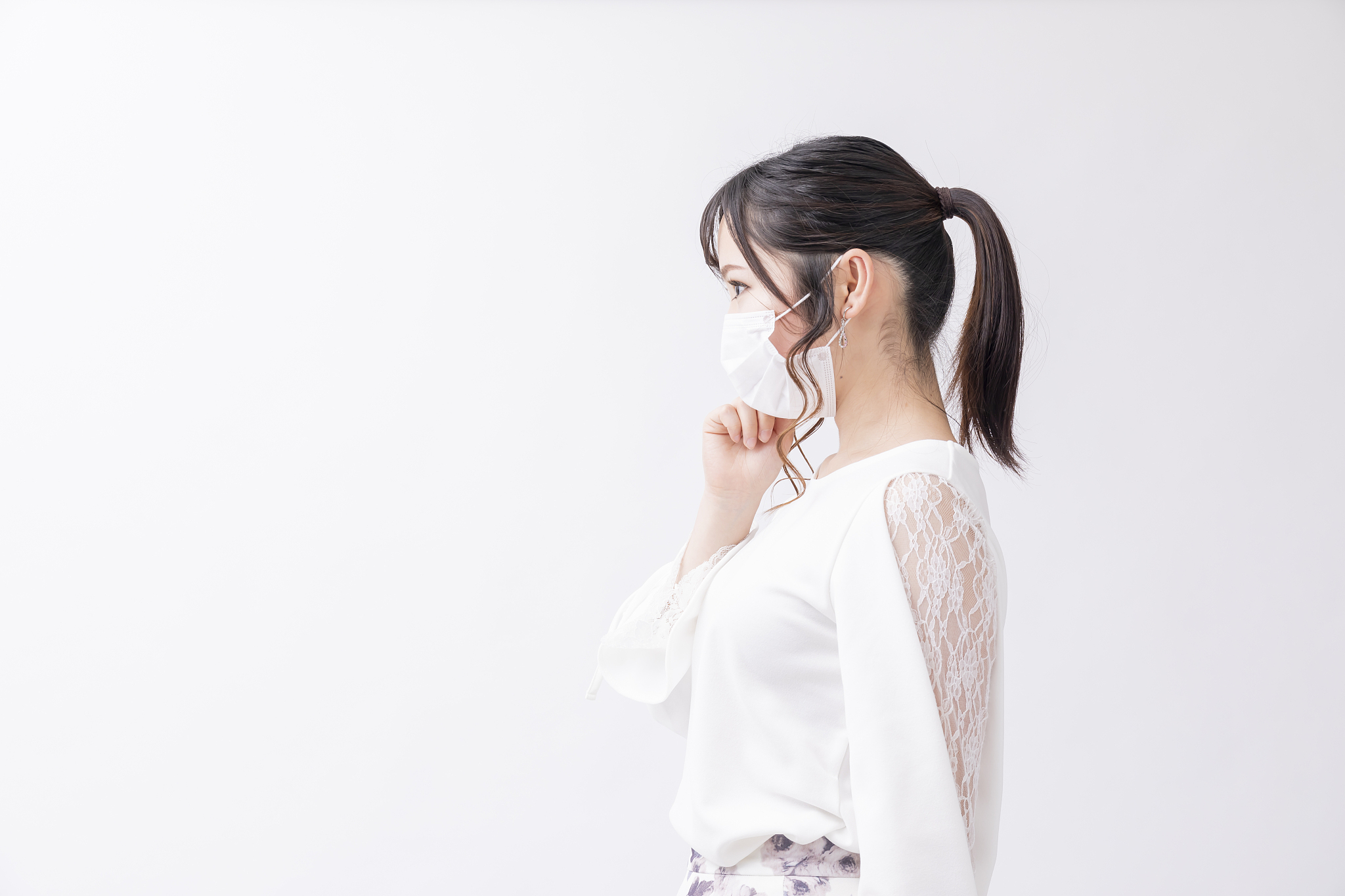 the female with the cleanliness who puts on a mask
