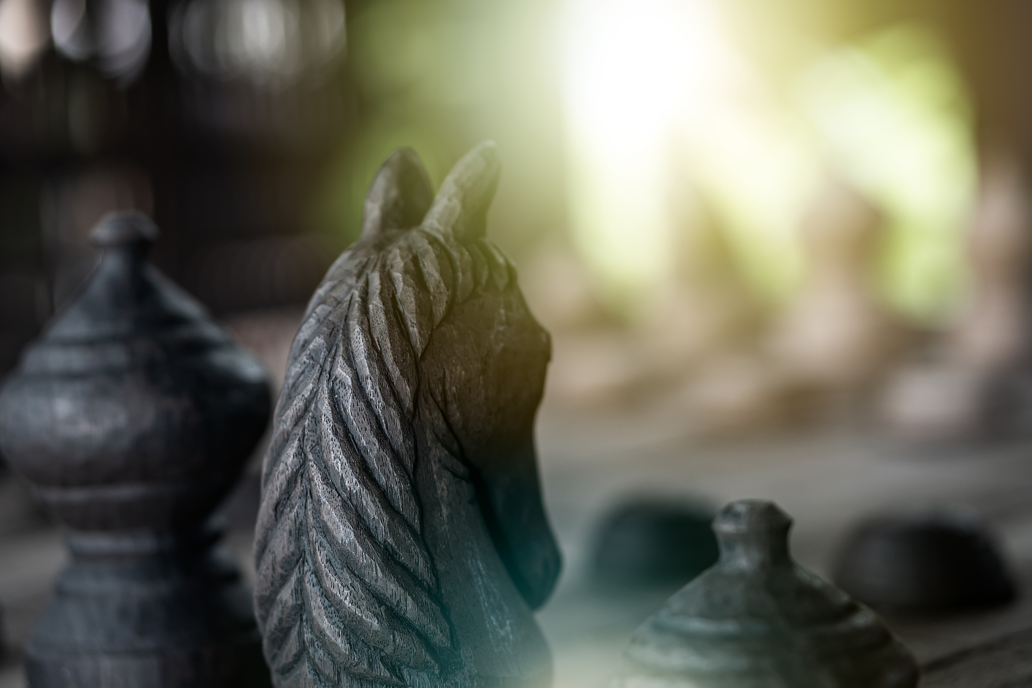 background of wooden thai chess game horse, king, queen, pawn on