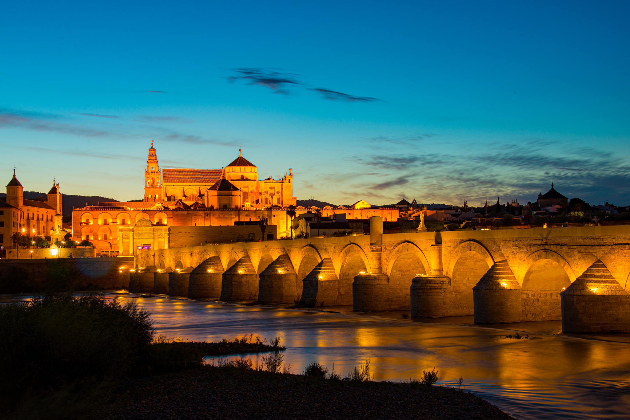 mosque-cathedral and roman bridge of cordoba, andalusia, spain
