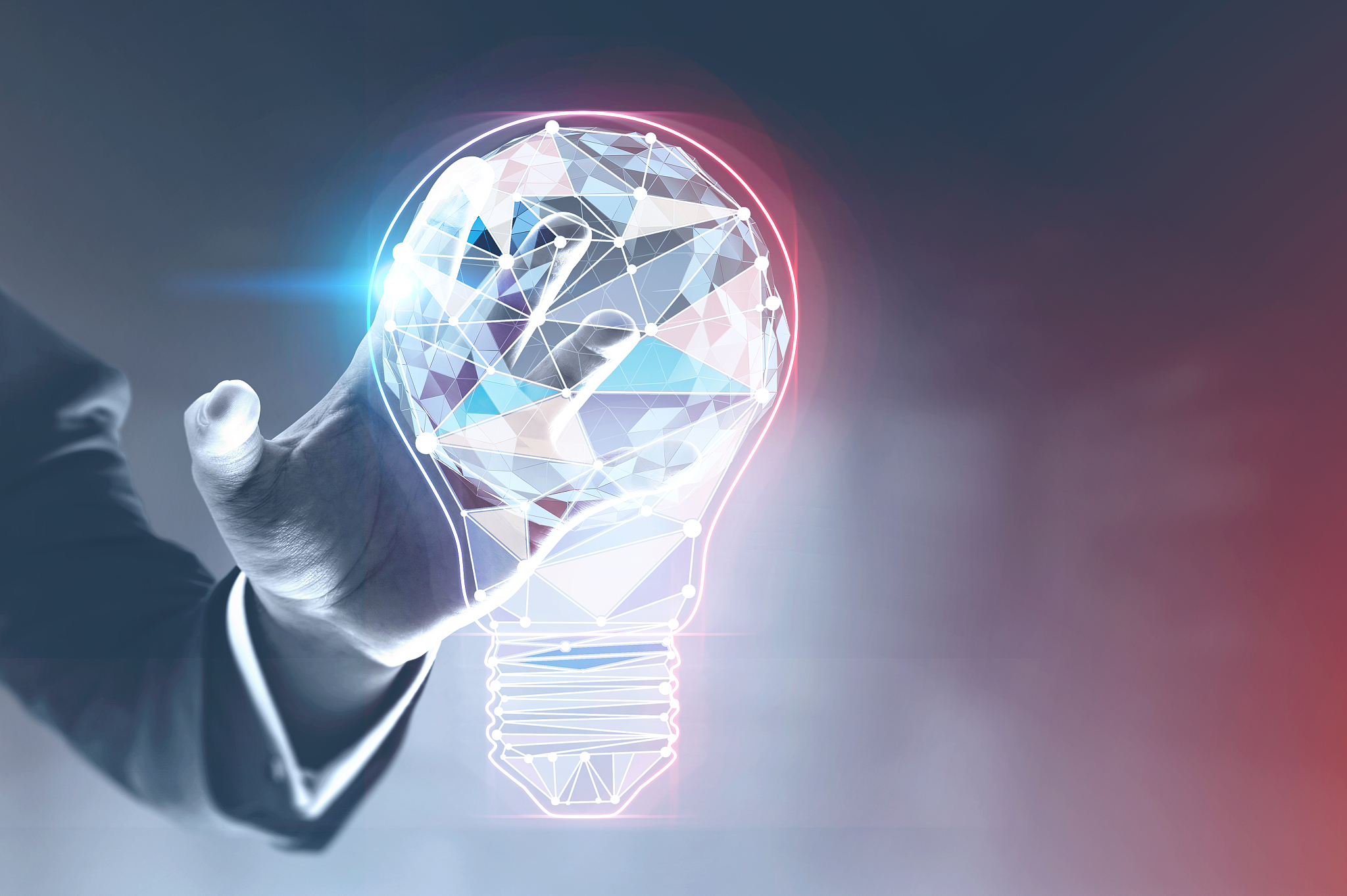 businessman hand touching light bulb interface