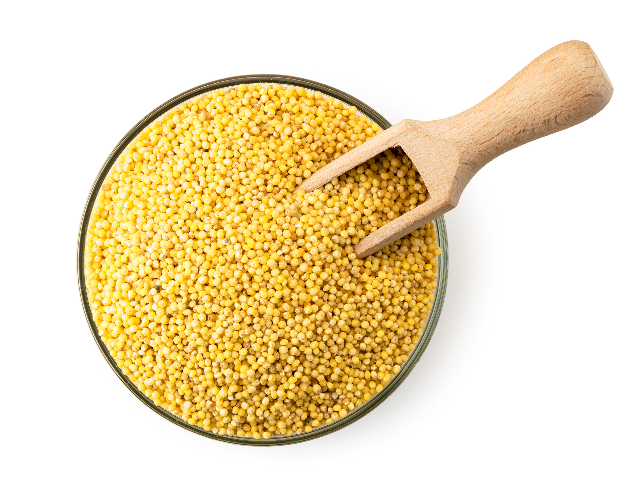 millet in a plate with a wooden spoon on a white. the form of th