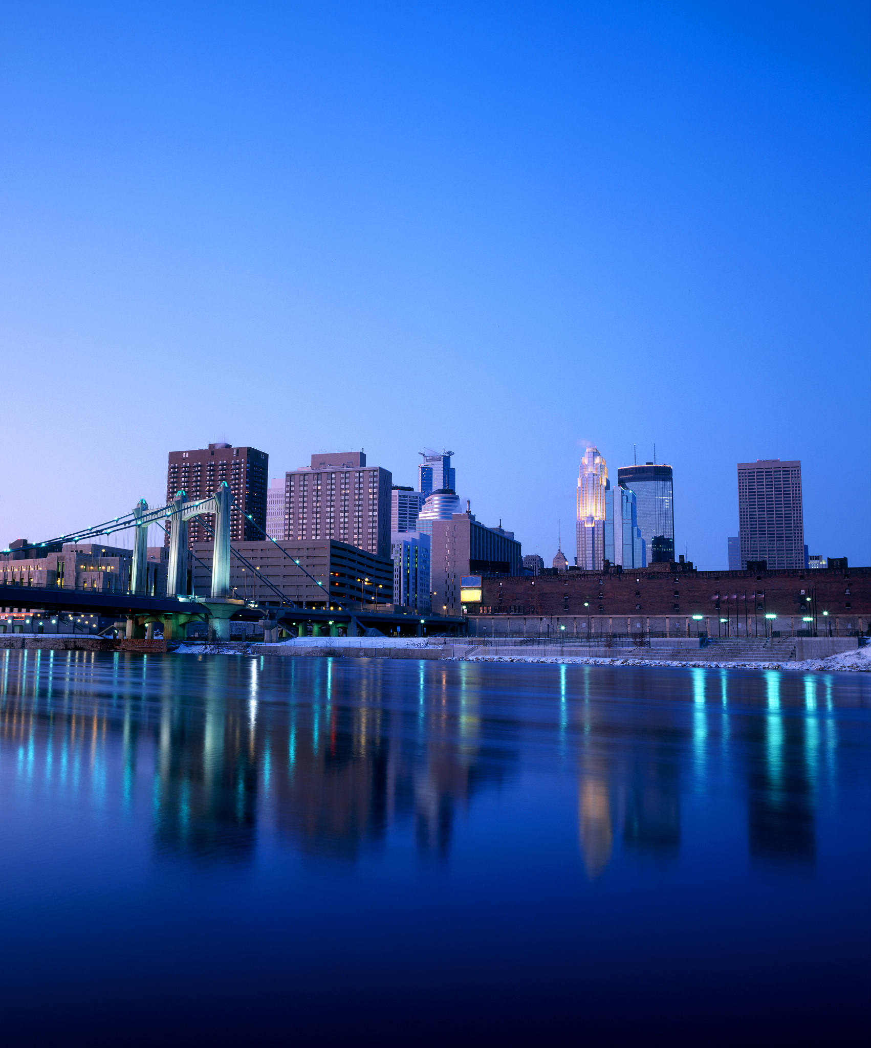 minneapolis, minnesota across the river on a winter evening