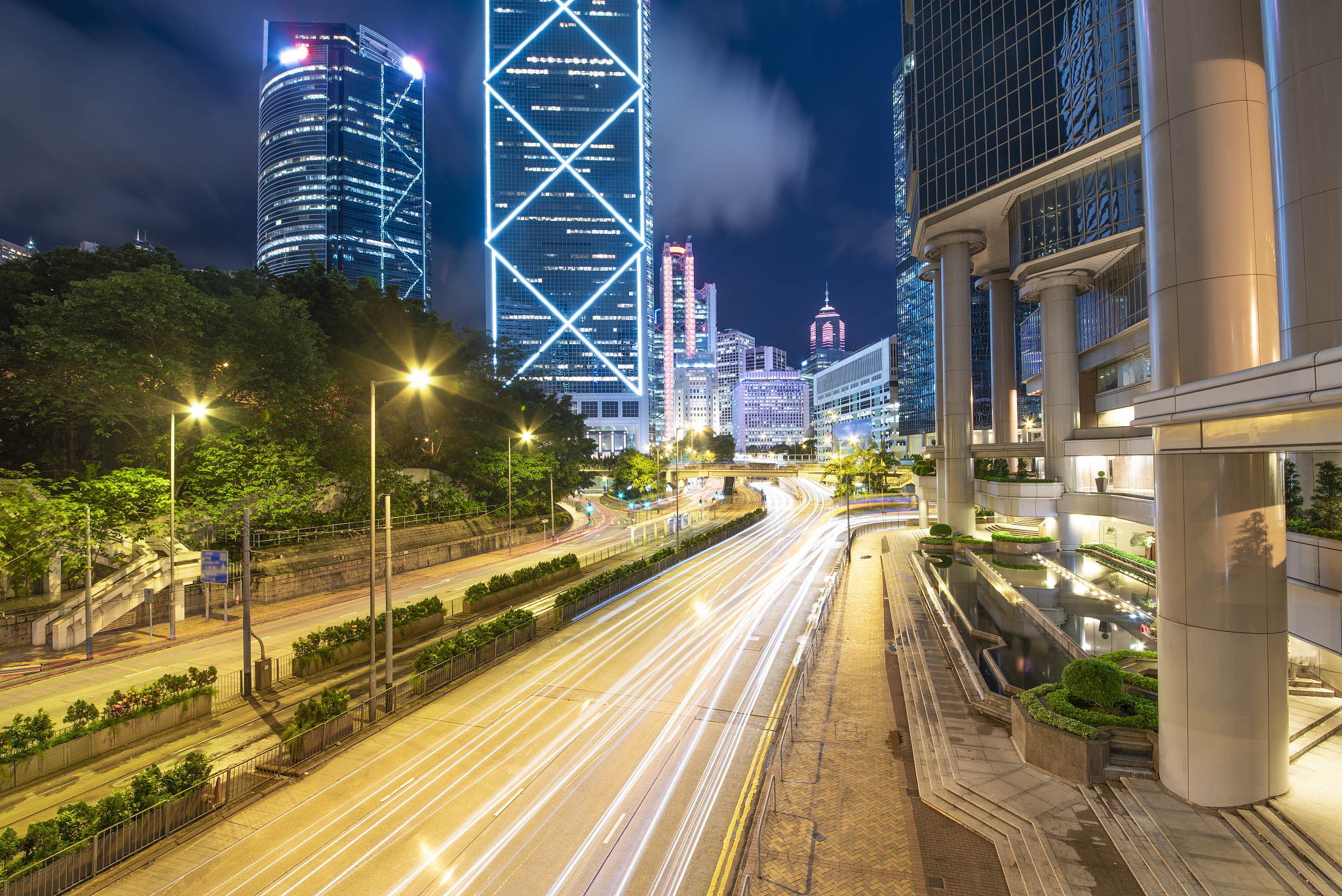 the night view of the city and the traffic in hong kong