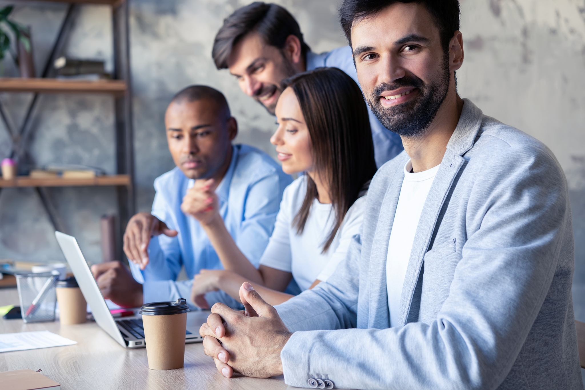 successful company with happy workers in modern office.