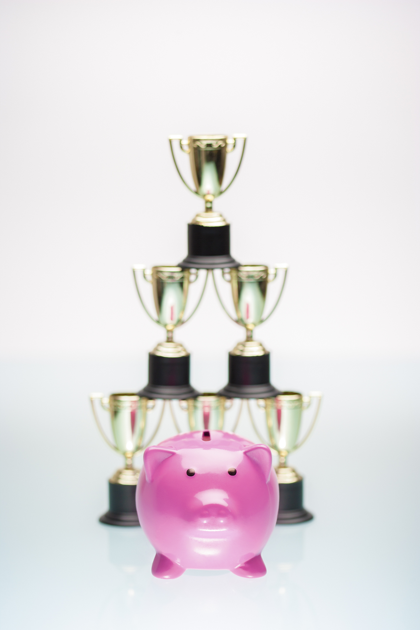 piggy bank and trophies