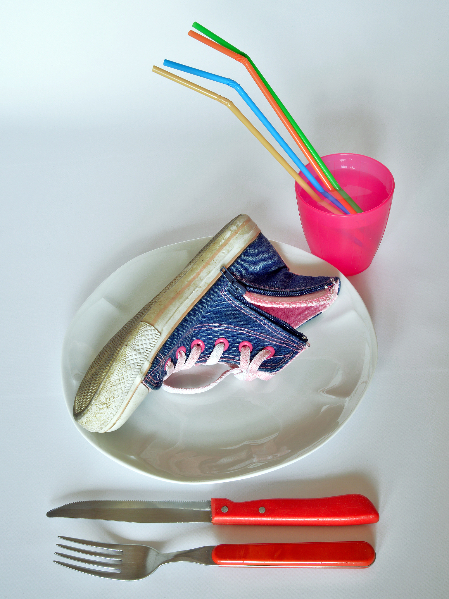 a plate with an old shoe inside instead of food