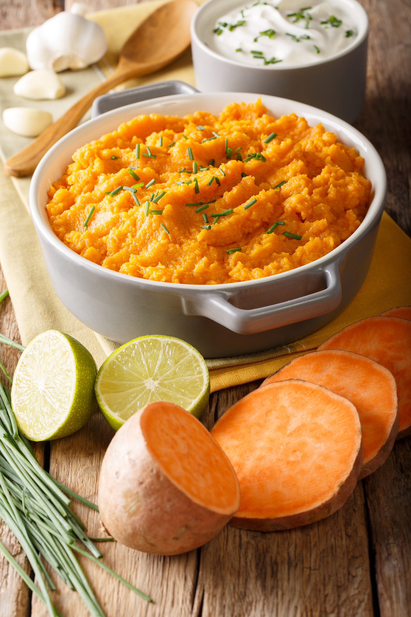 homemade puree of sweet potato with ingredients close-up in a bo