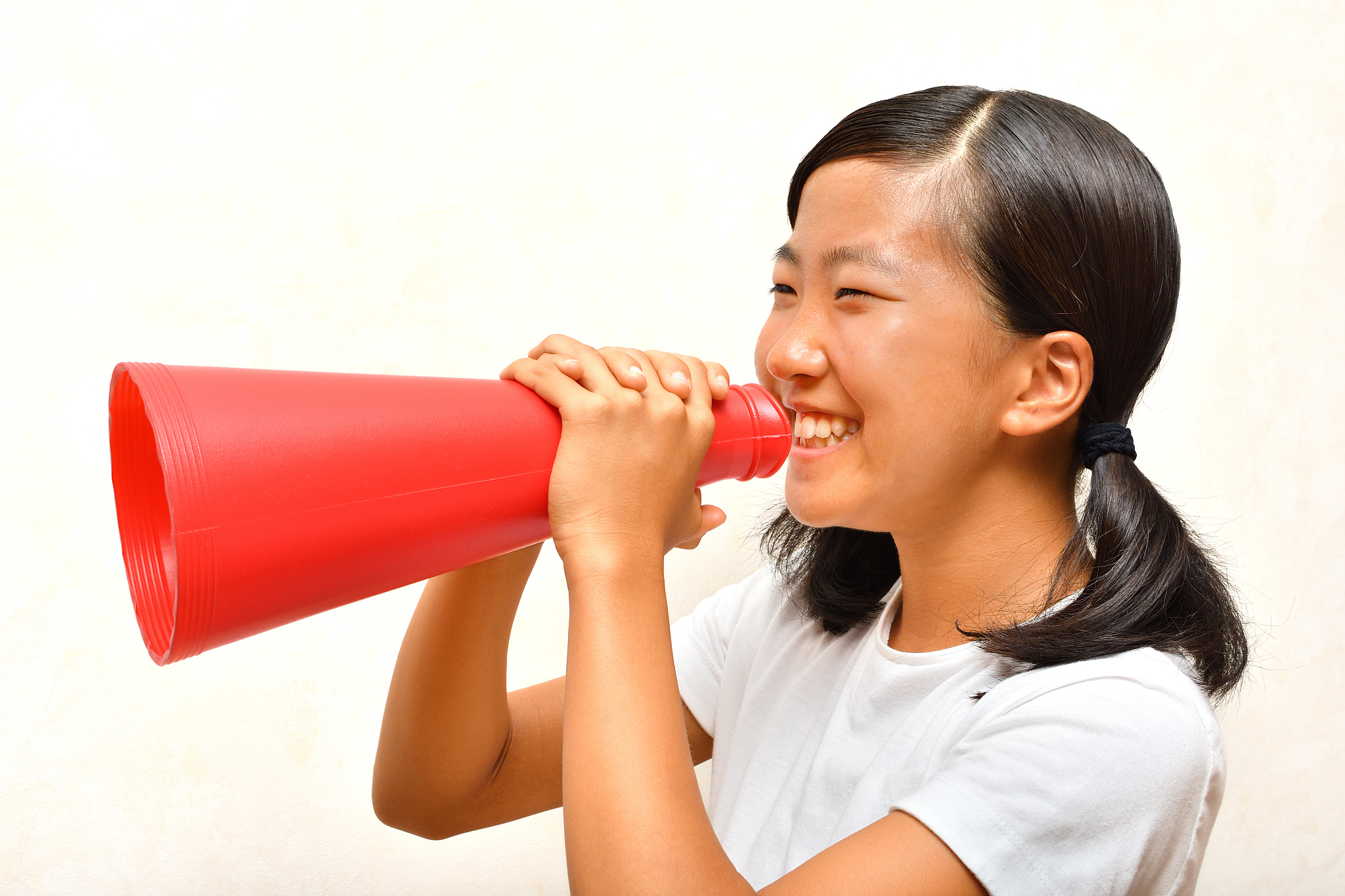 japanese girl cheering with megaphone