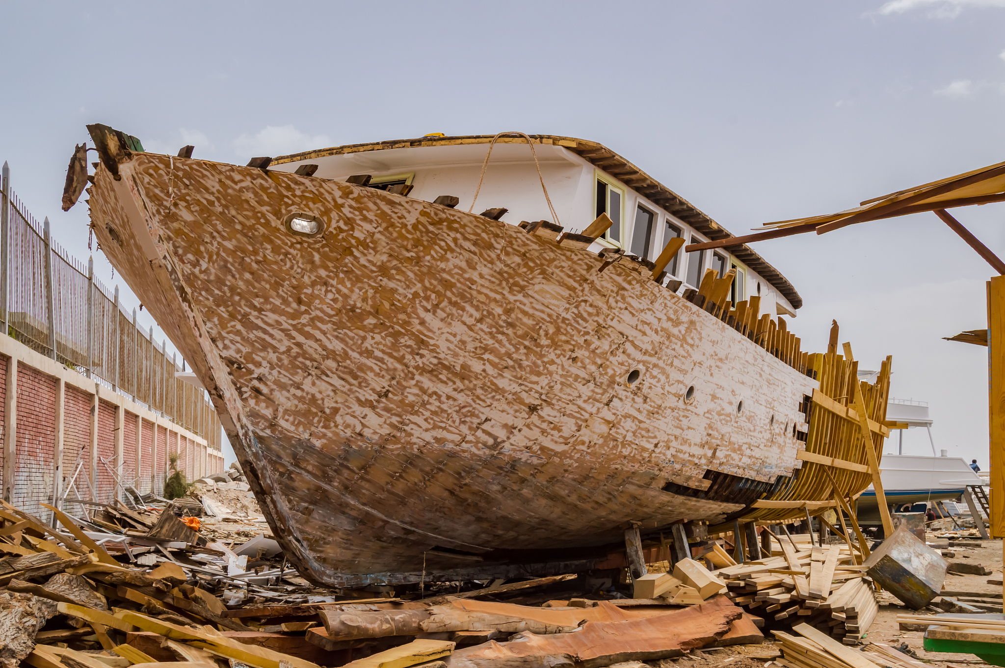 wooden ship being renovated in a construction