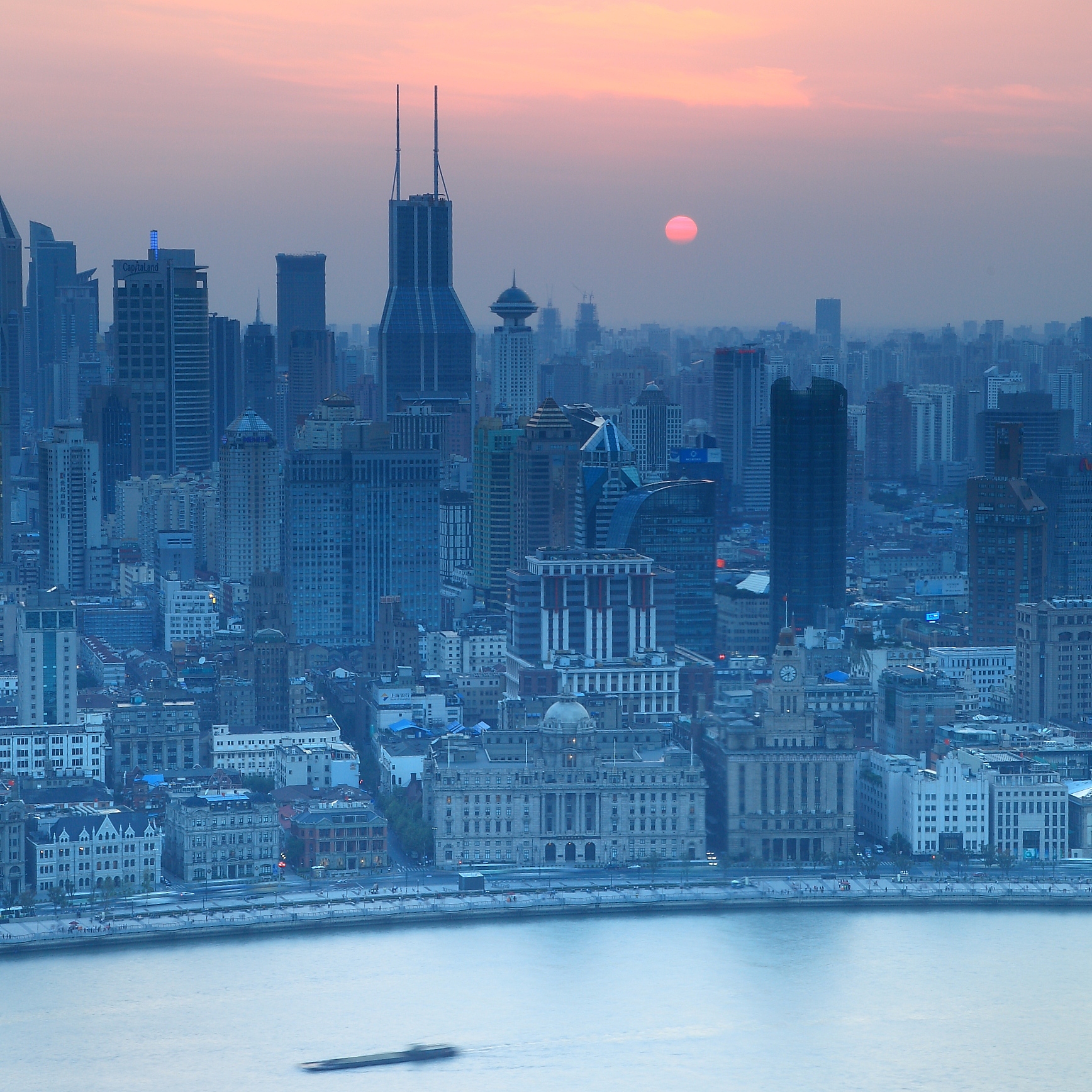 sunset over shanghai seen from pudong