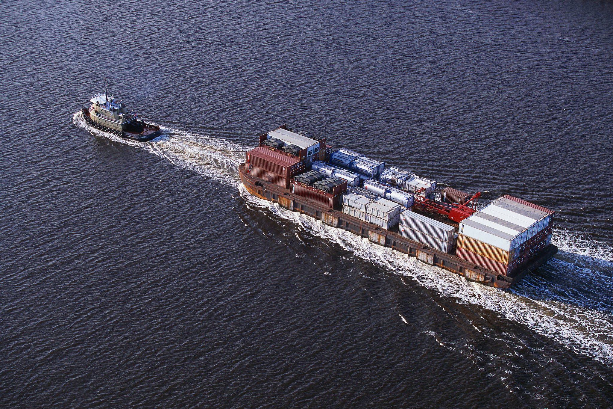 overhead view of tug pulling freight